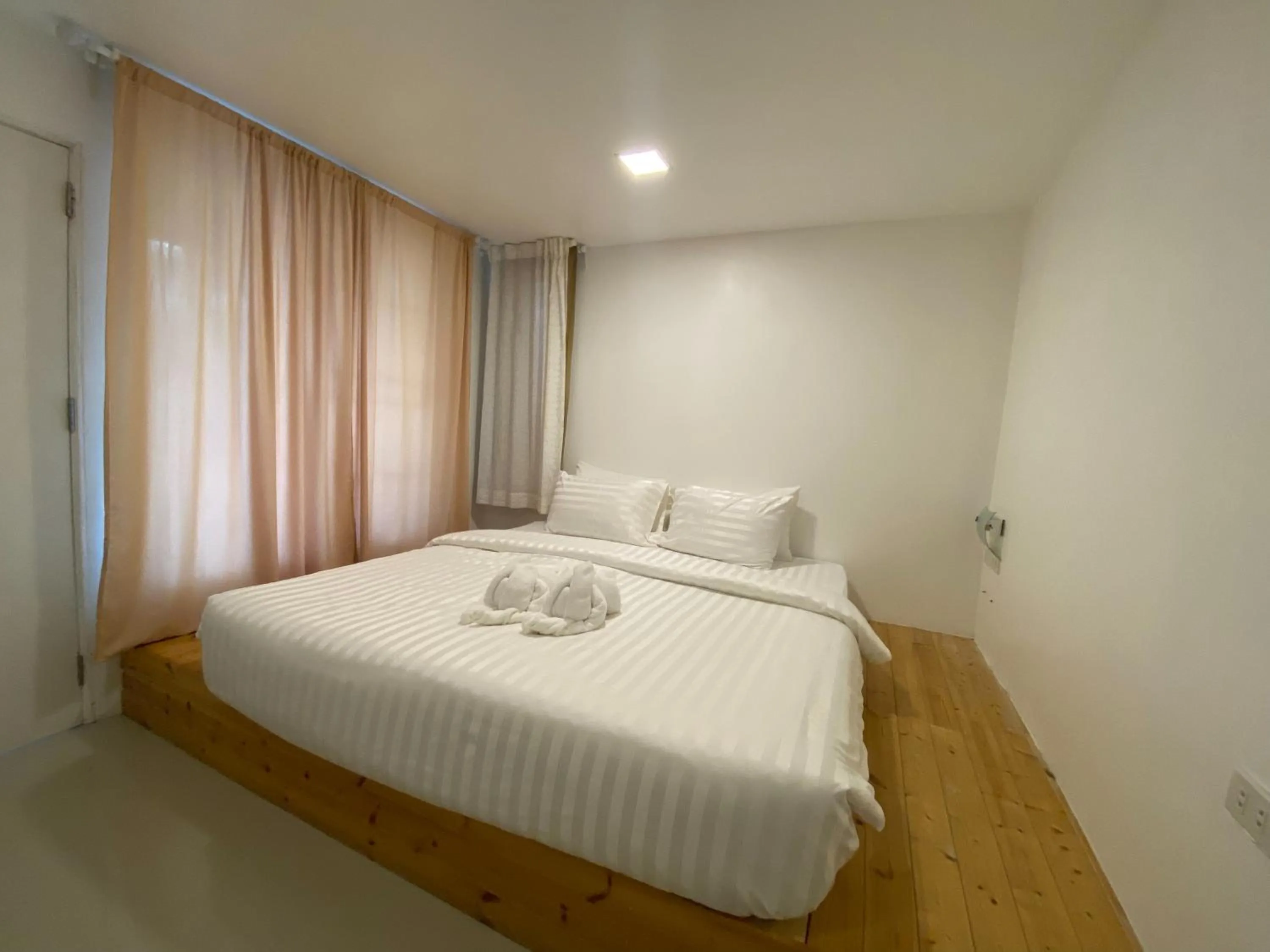 Bedroom, Bed in White house bailan resort