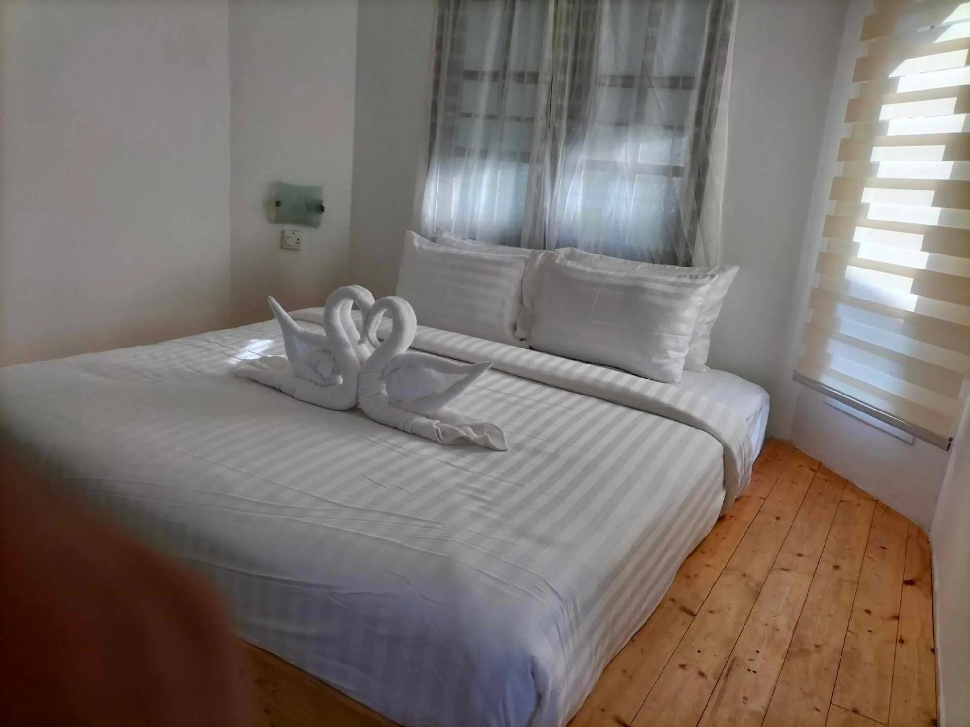 Bed in White house bailan resort