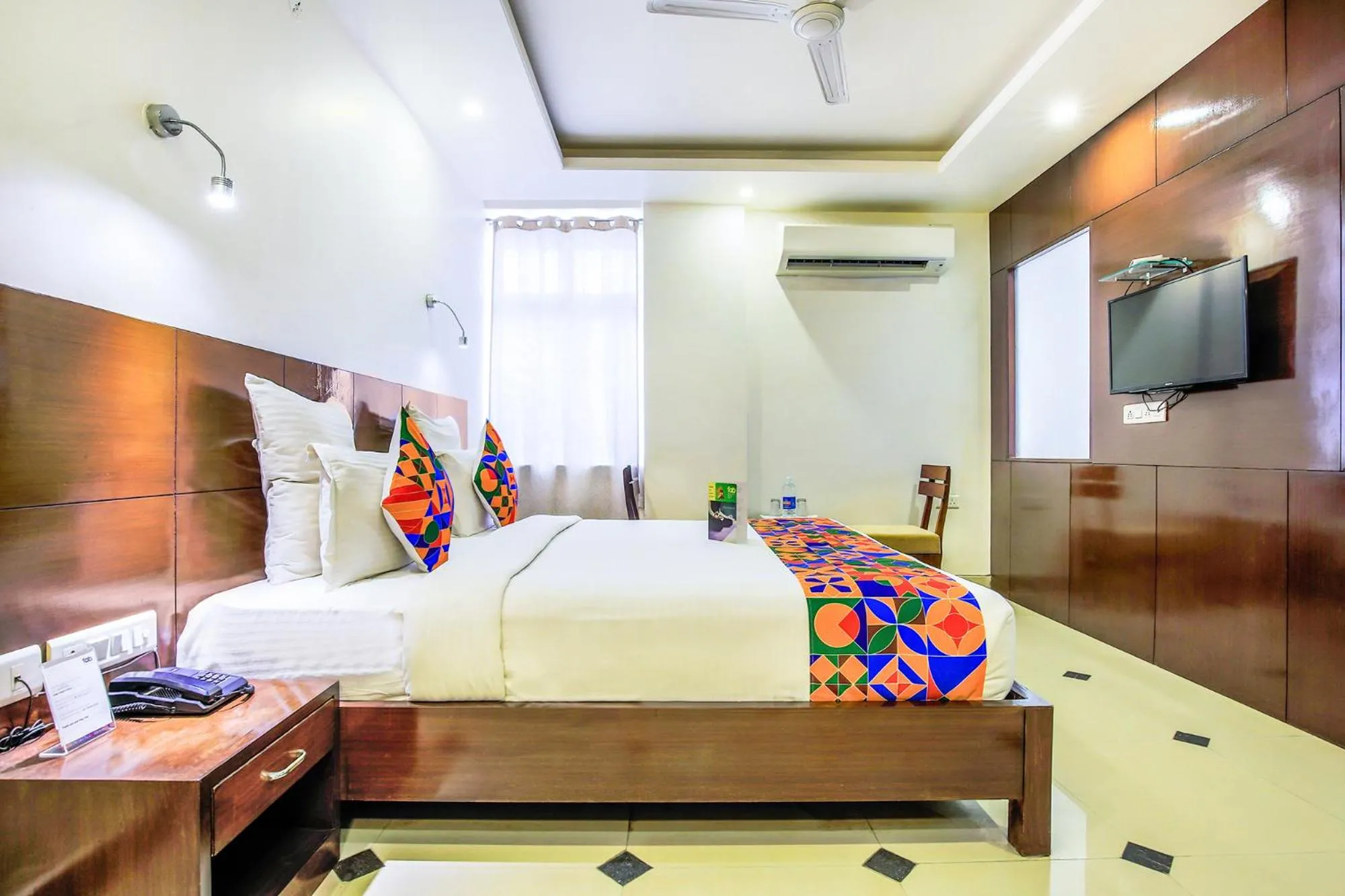 Bed in FabHotel Tipsyy Inn Suites