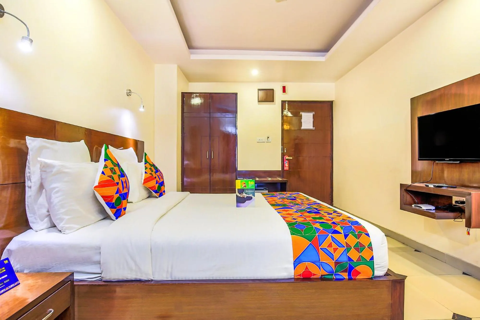 Bed in FabHotel Tipsyy Inn Suites