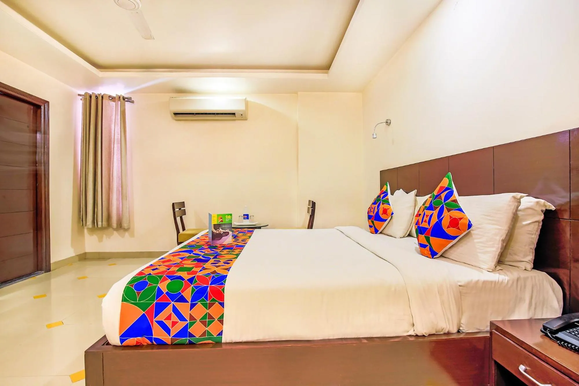 Bed in FabHotel Tipsyy Inn Suites