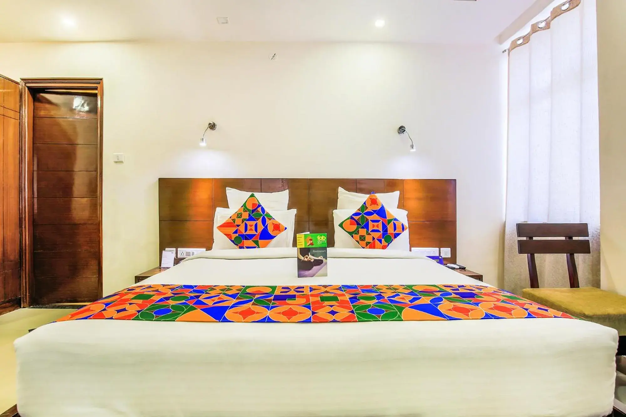 Bed in FabHotel Tipsyy Inn Suites Bed in FabHotel Tipsyy Inn Suites