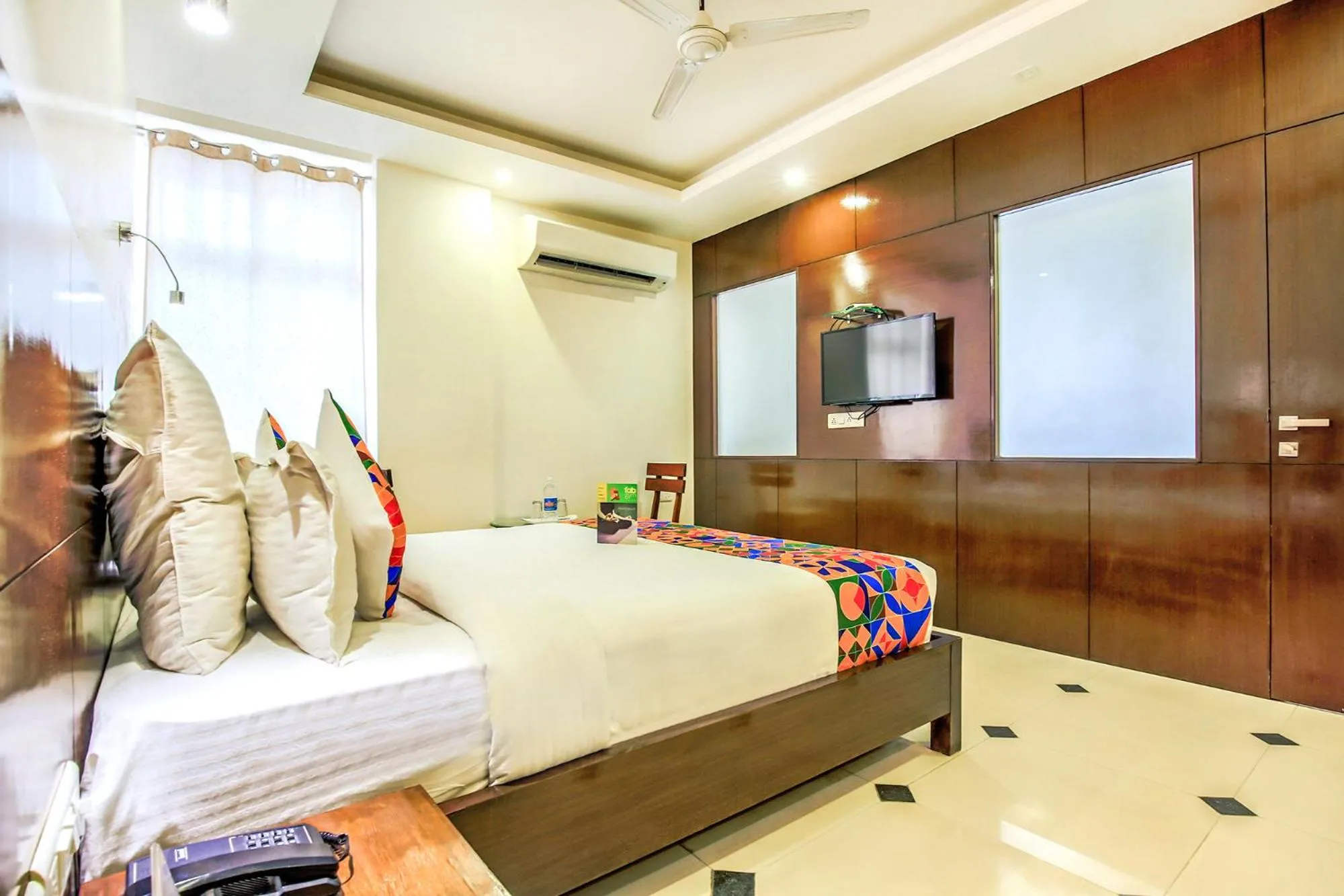 Bed in FabHotel Tipsyy Inn Suites