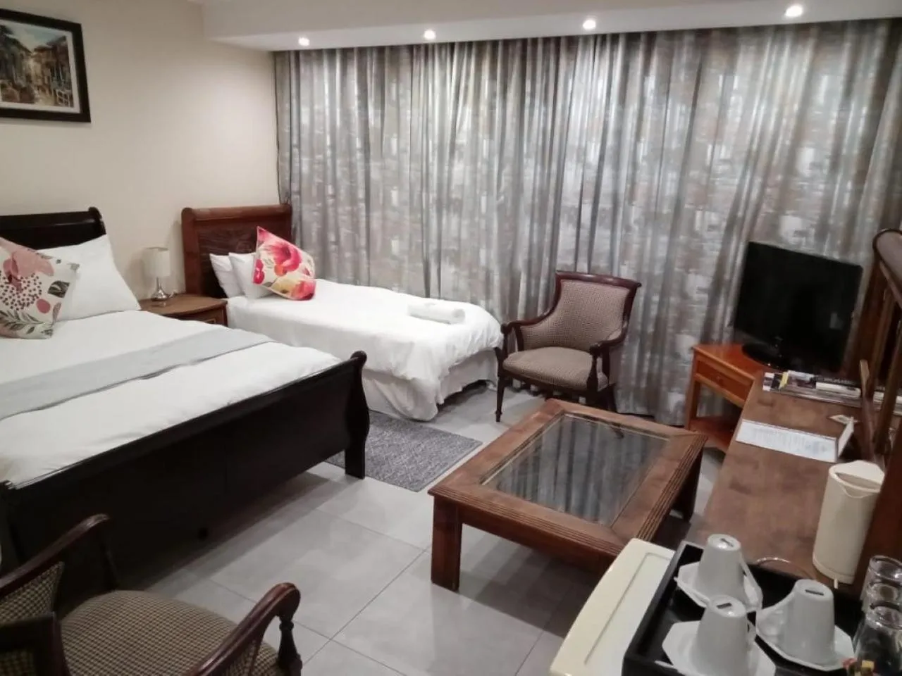 Photo of the whole room, Bed in Orchids Lodge