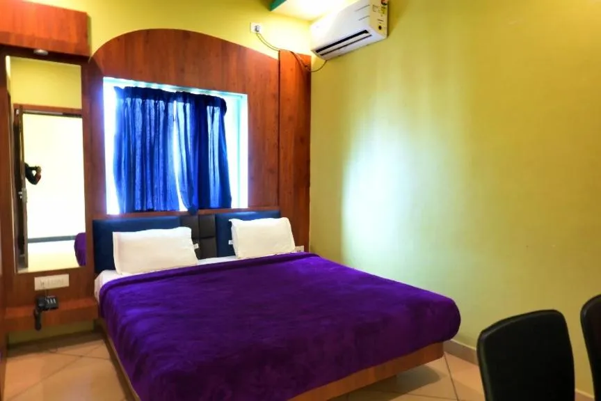 Bed in Hotel Bharati