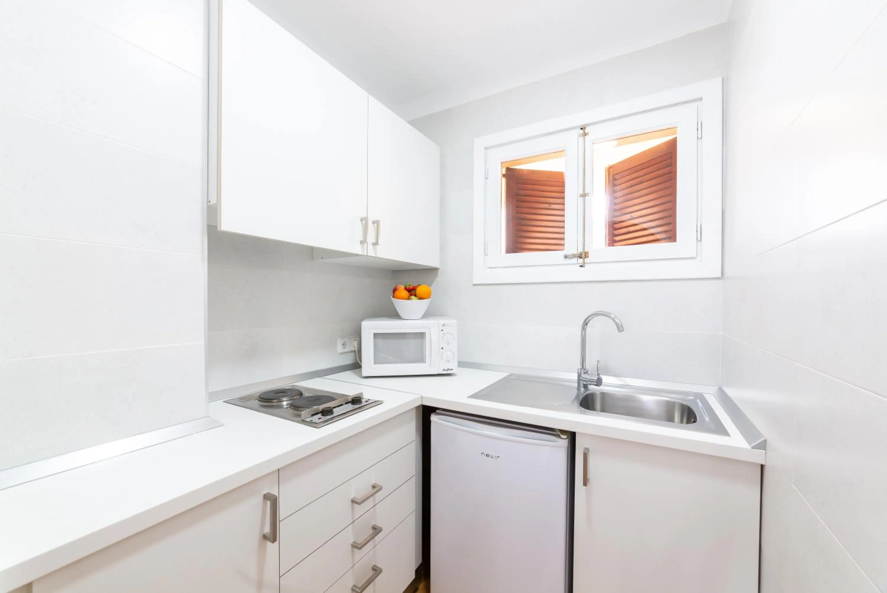 Kitchen or kitchenette in Apartamentos Casa Vida
