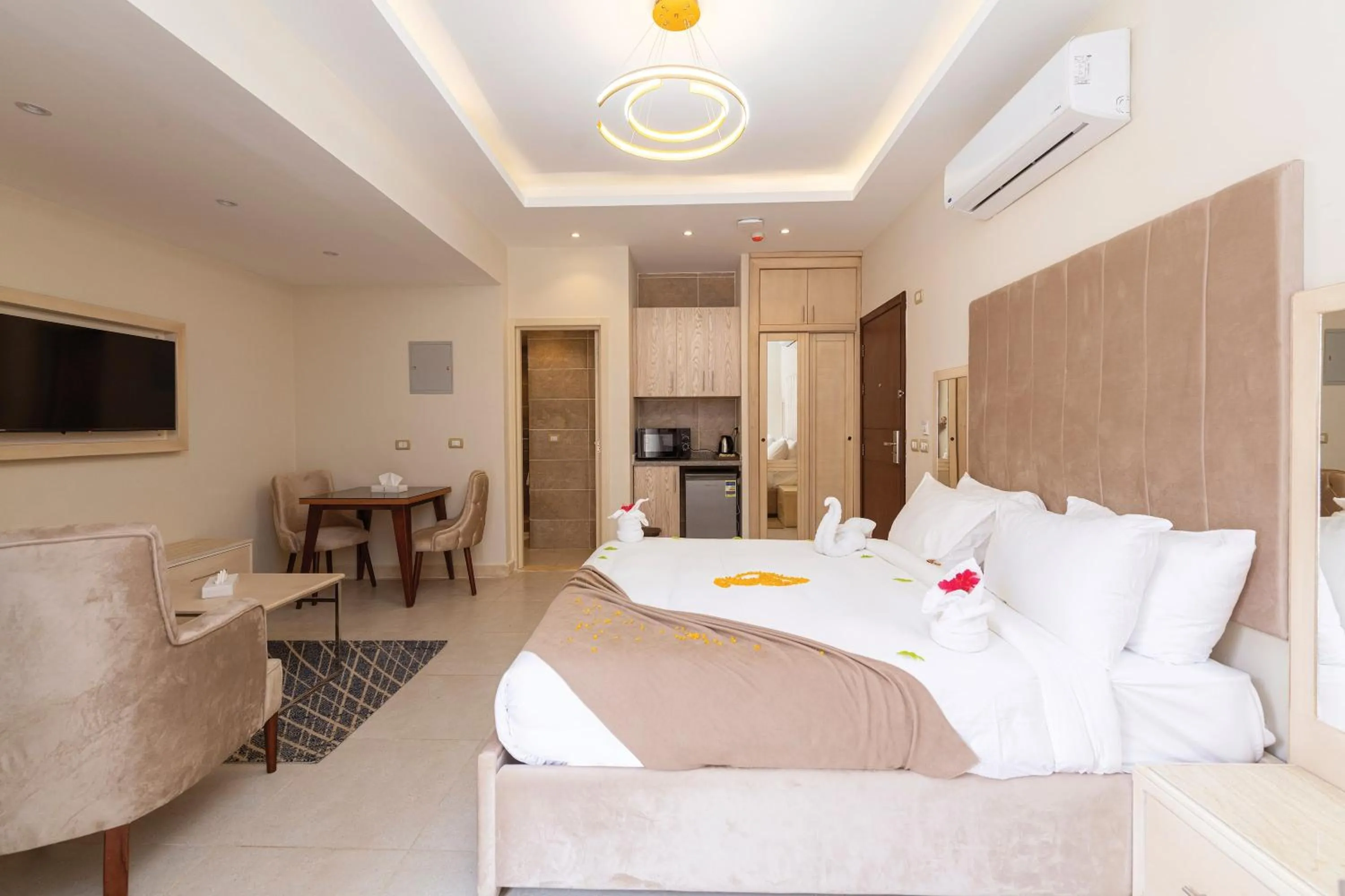 Kitchen or kitchenette, Bed in Marom Port Said Resort & Beach