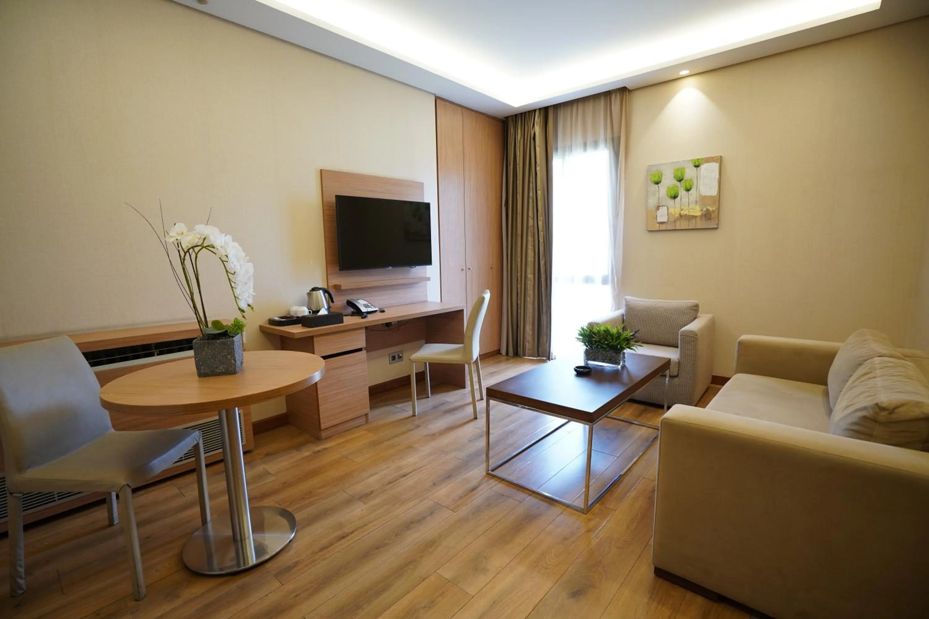 Living room in Heaven Prestige Hotel