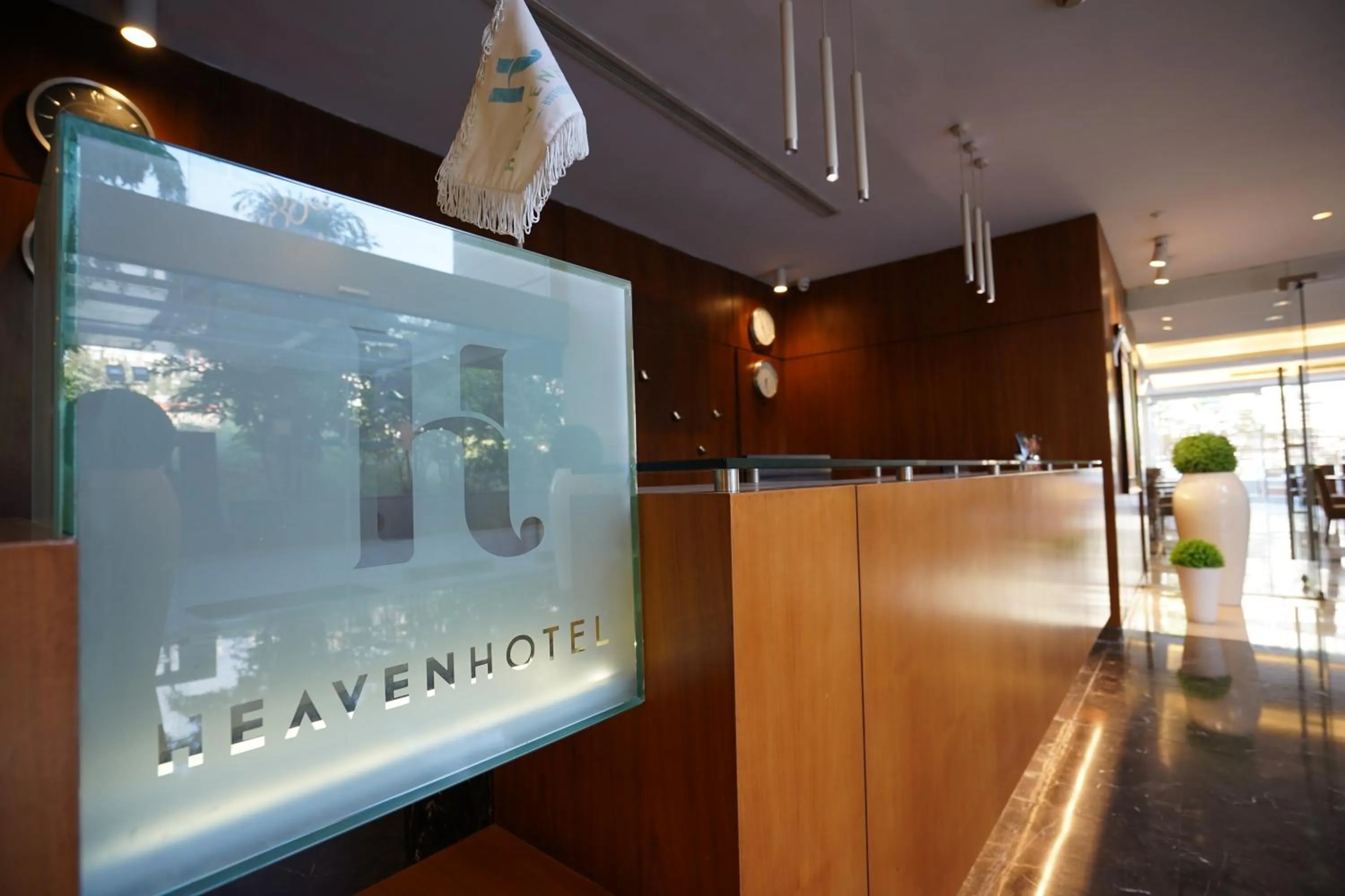 Property logo or sign in Heaven Prestige Hotel