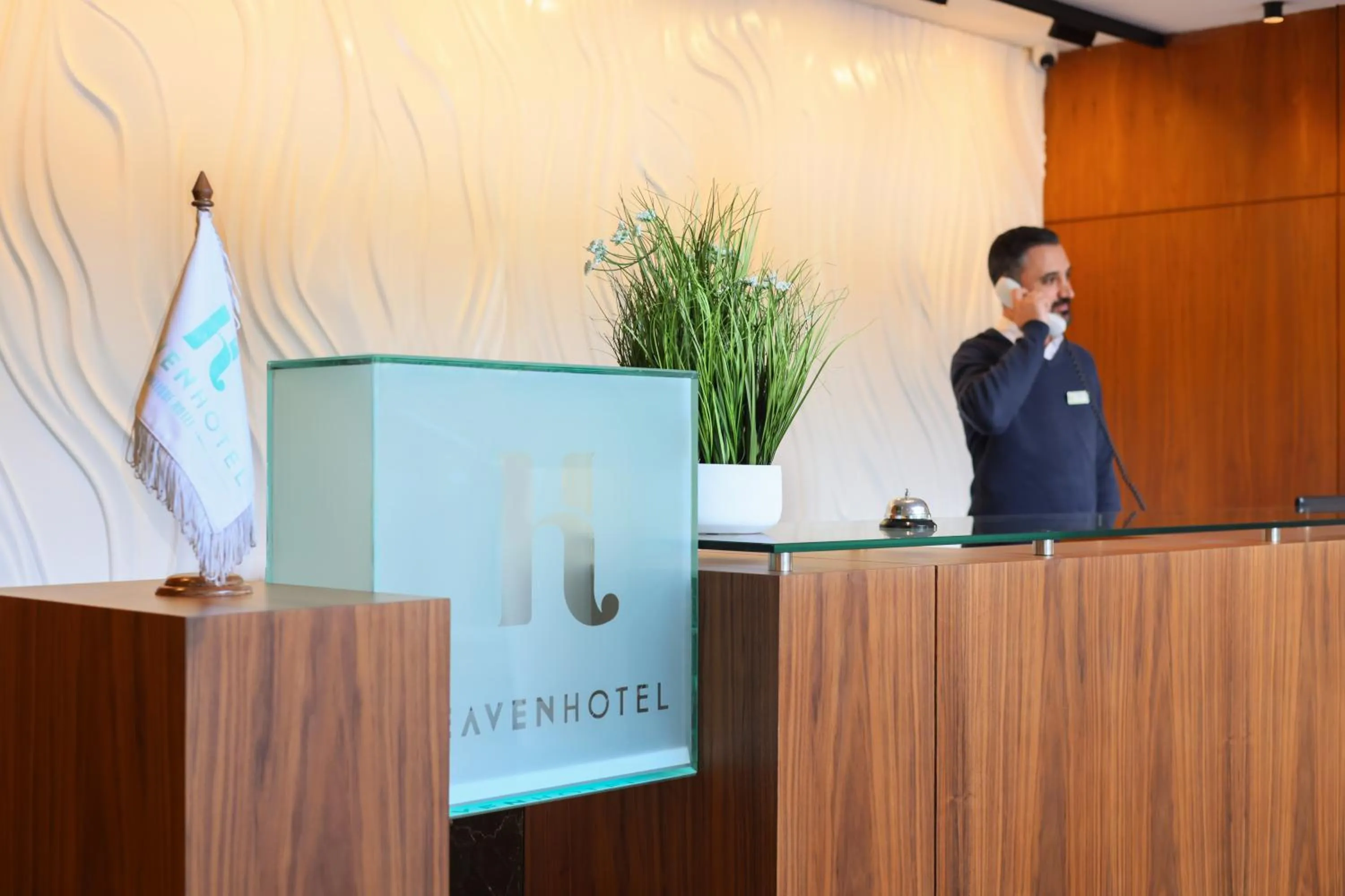 Property logo or sign in Heaven Prestige Hotel