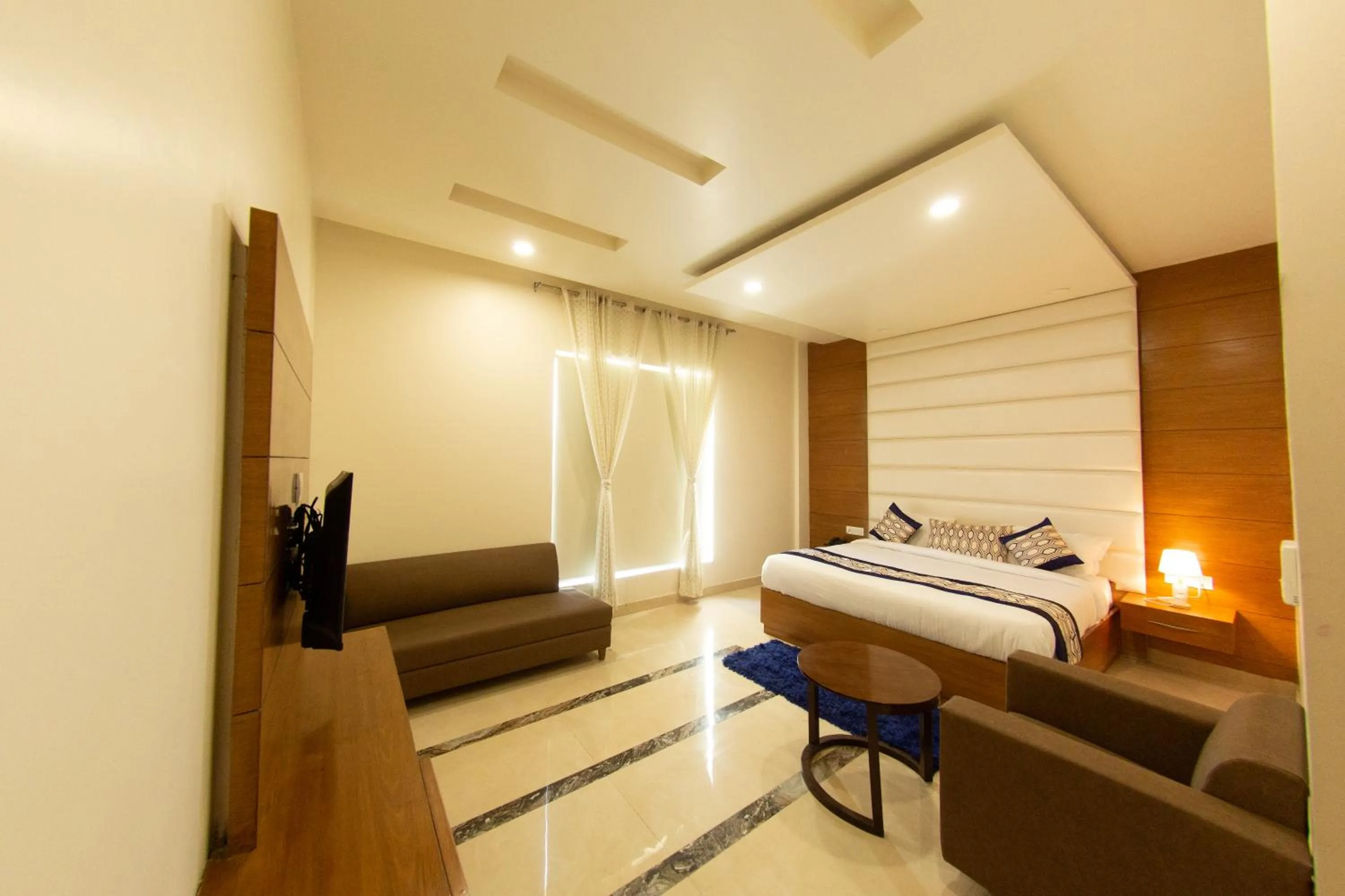 Photo of the whole room in Comfort Hotel Amritsar by Choice Hotels