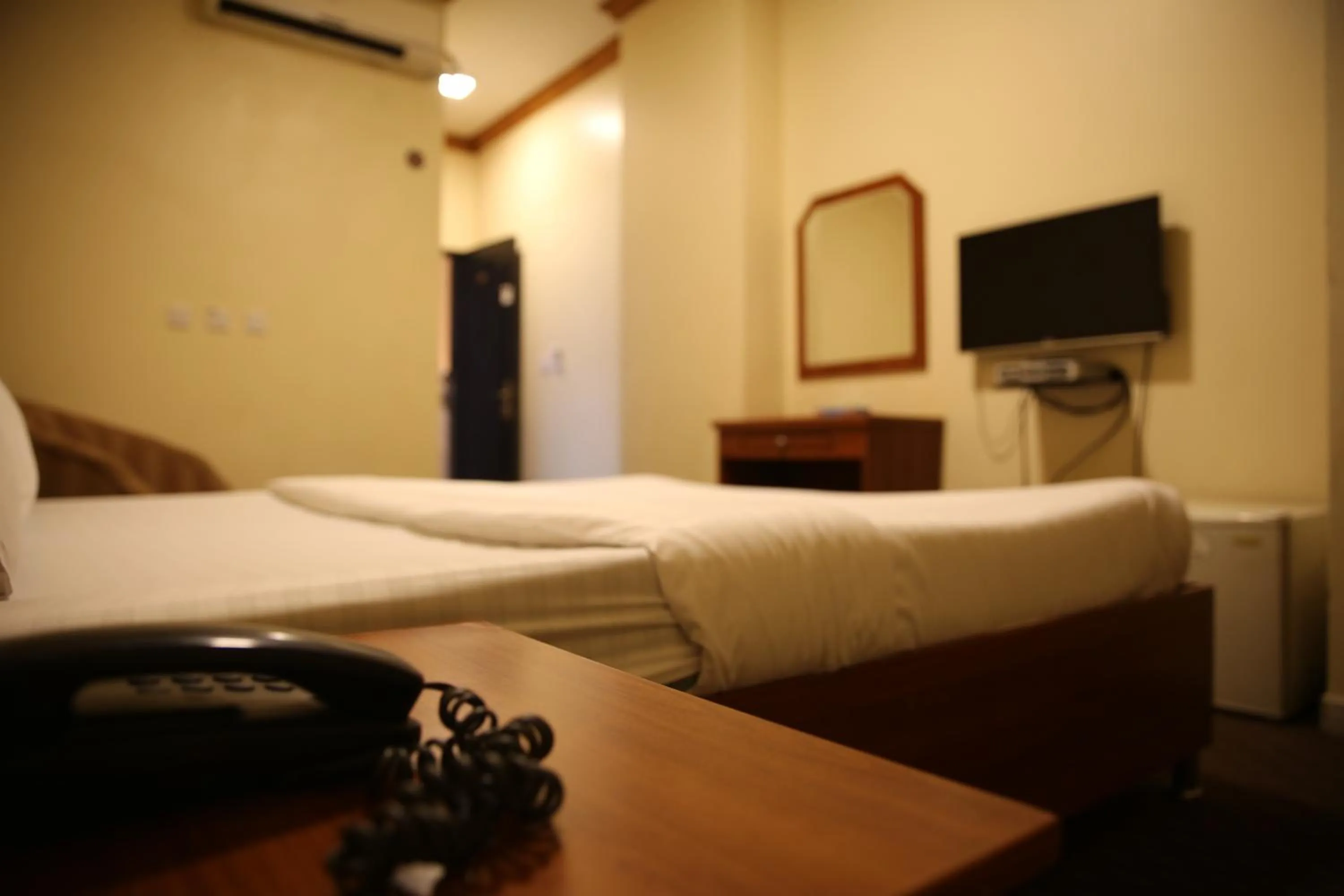 Bed in Qaser Alhamra Serviced apartments