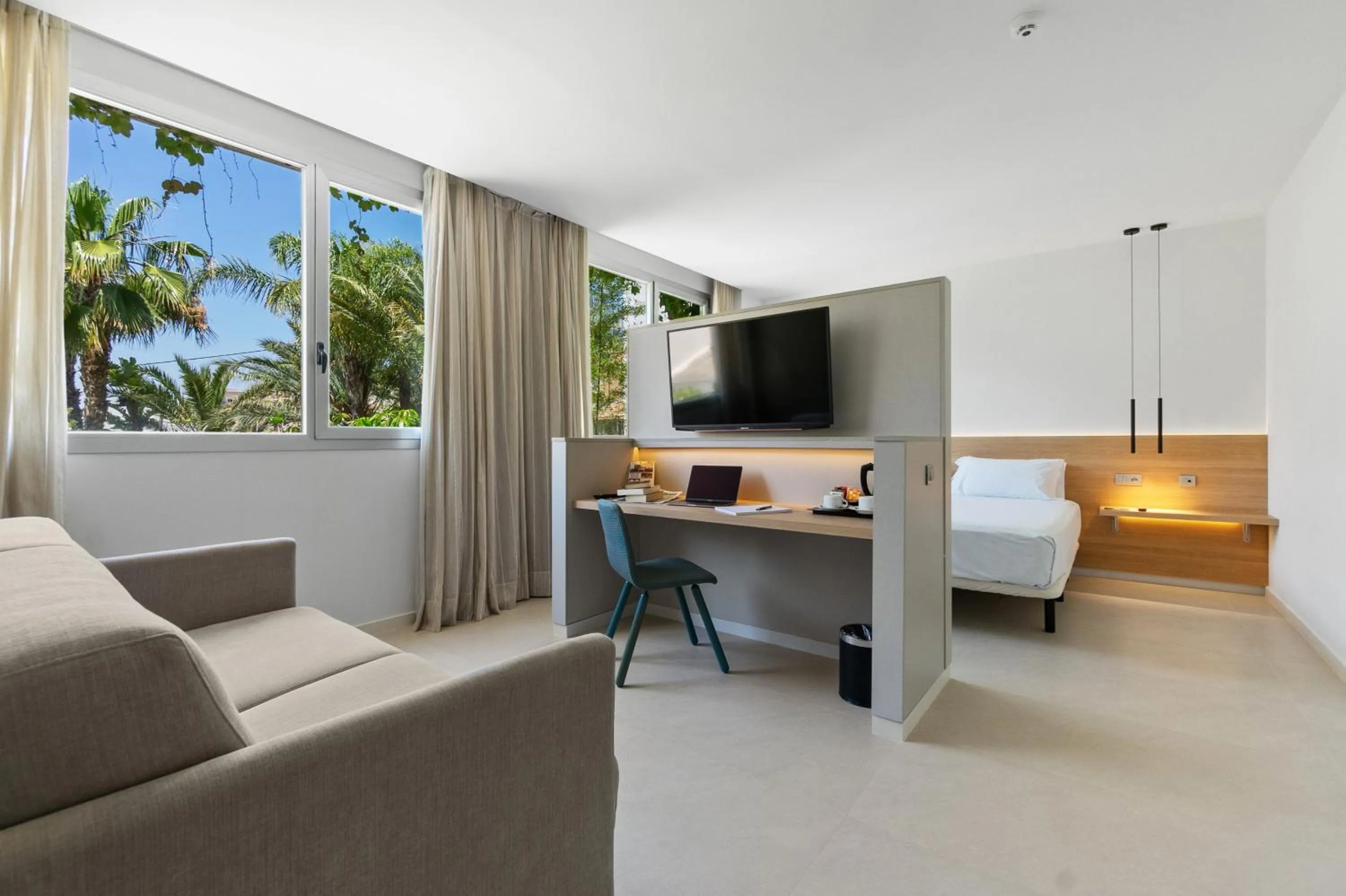 Living room, Bed in Hotel Areca