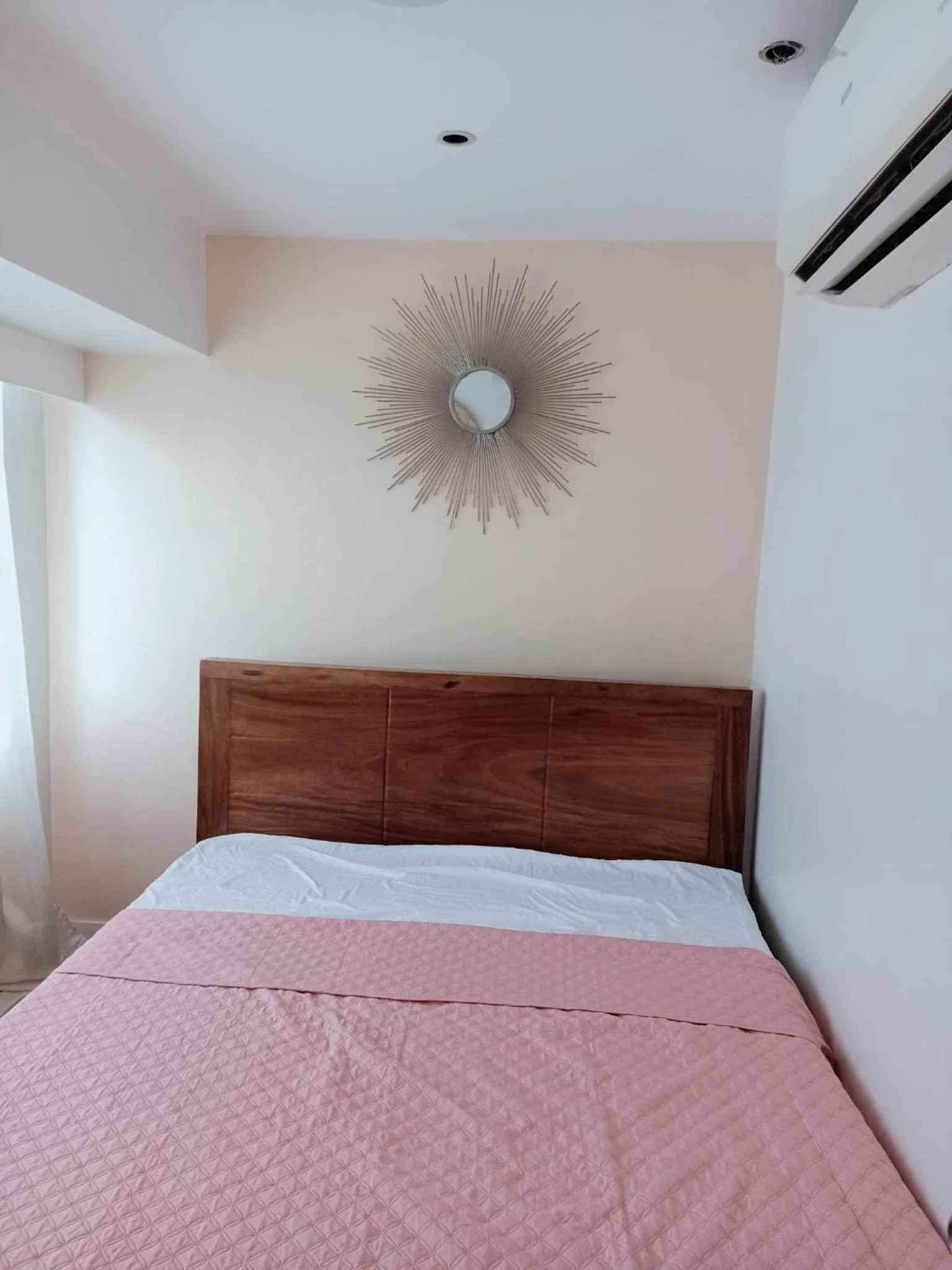 Bed in Fort Victoria Condominium Tower C