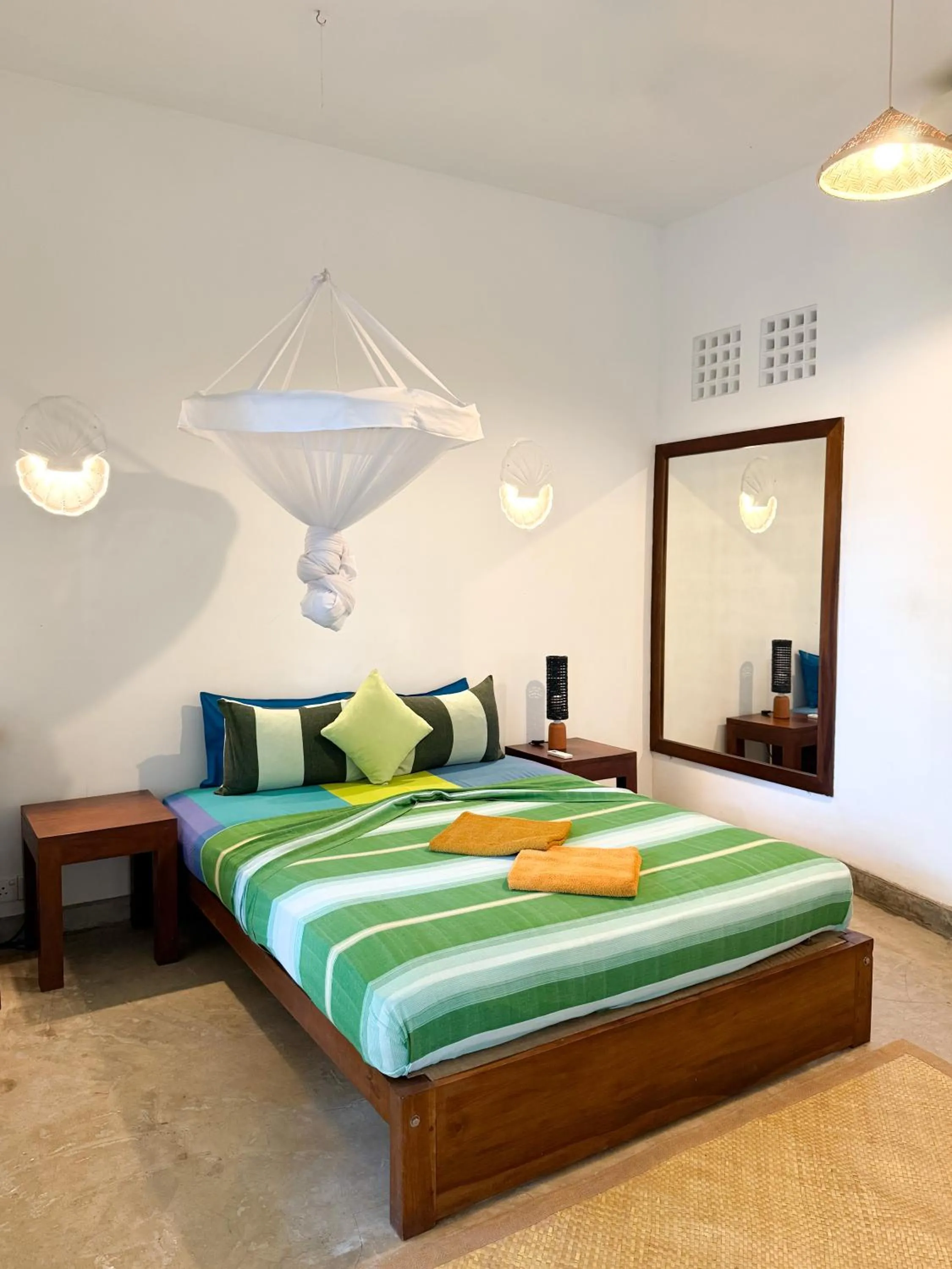 Bed in Palm villa Mirissa hotel&spa