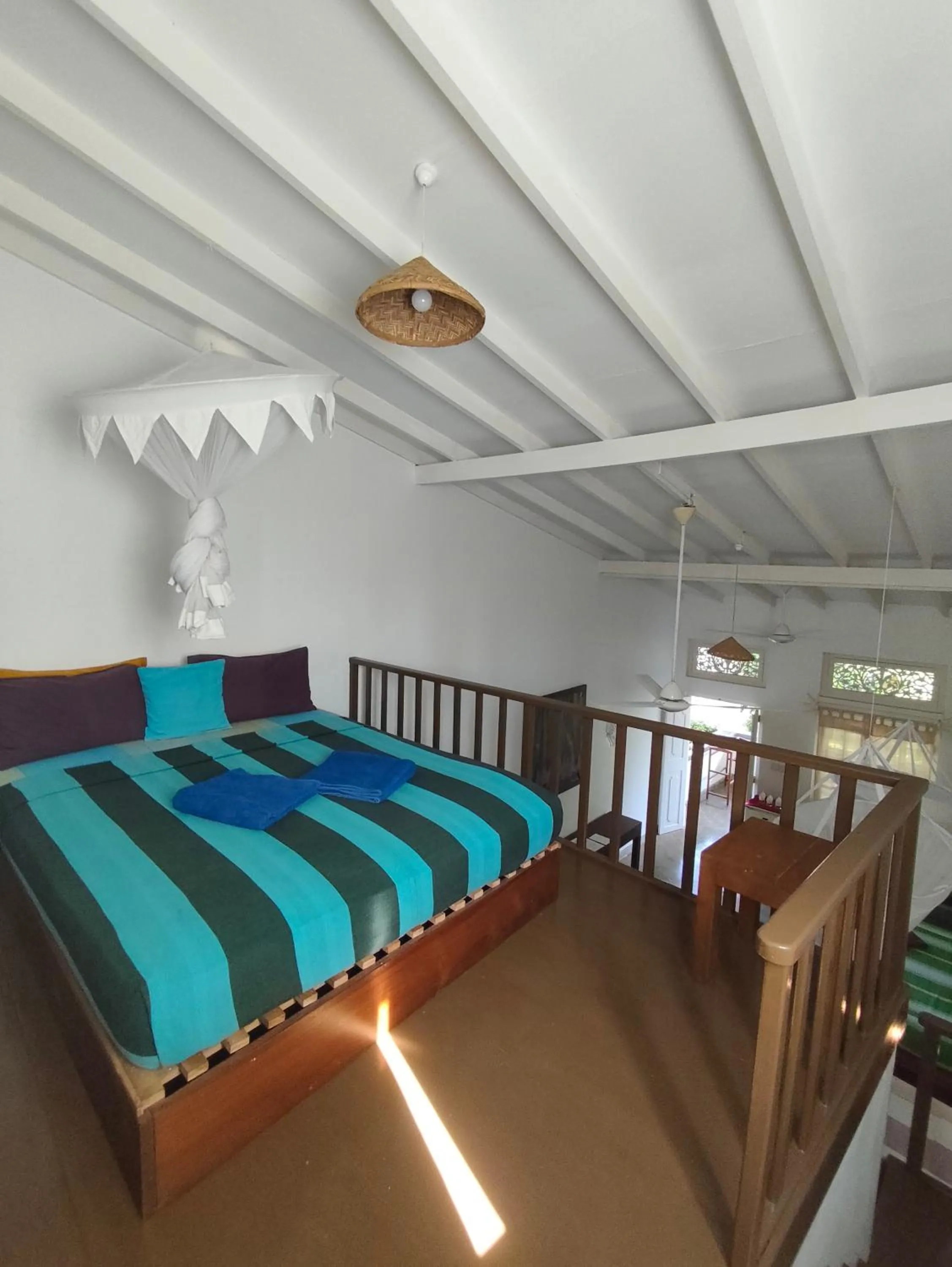 Bed in Palm villa Mirissa hotel&spa
