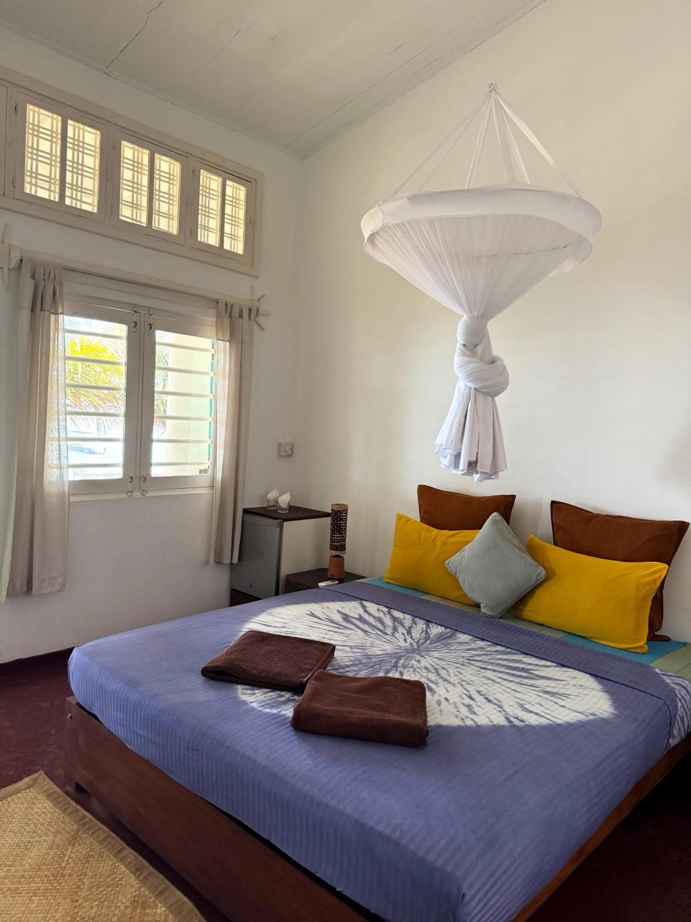 Bed in Palm villa Mirissa hotel&spa