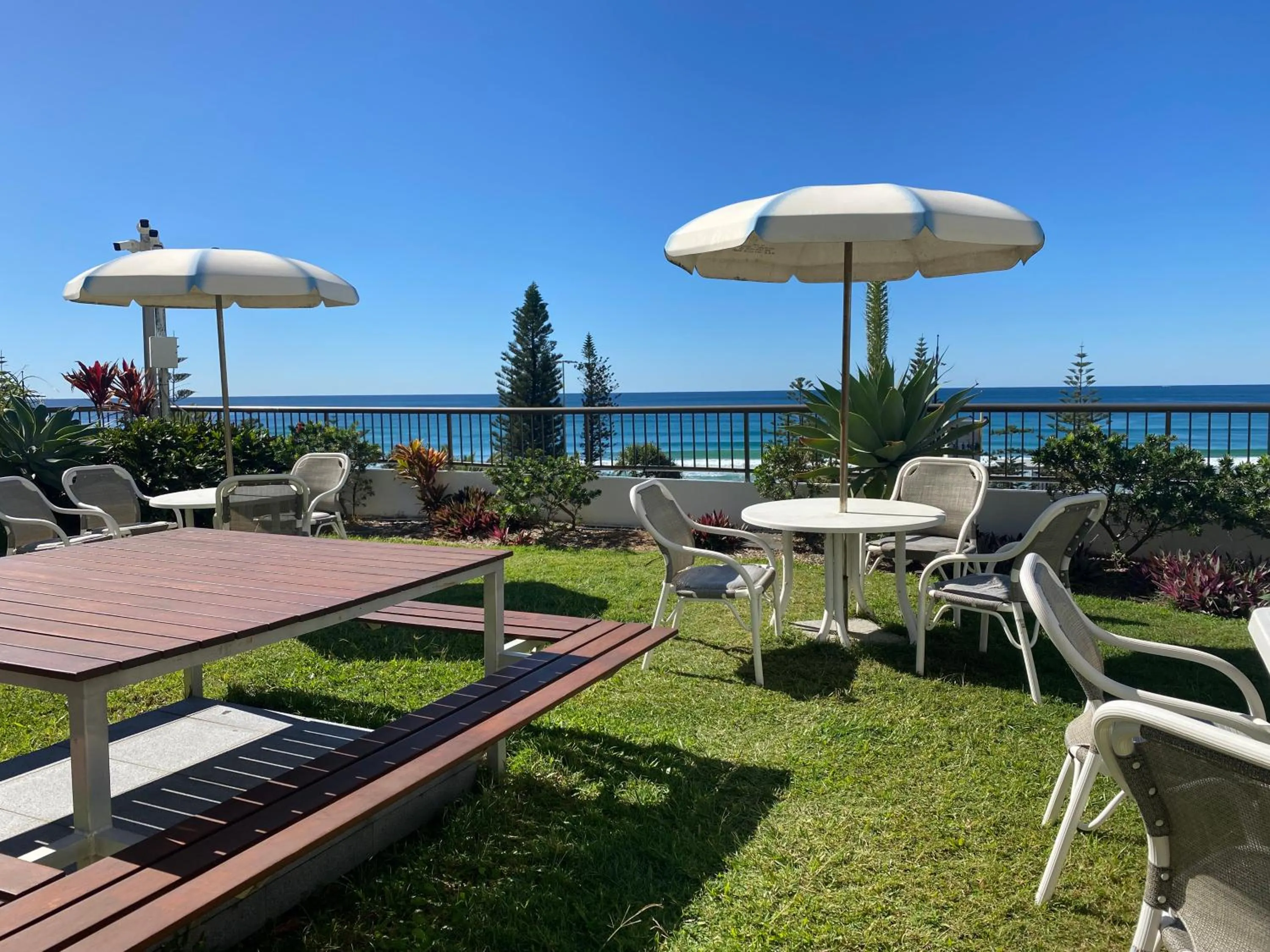 Patio in Oceanfront Family Apartment Pool & BBQ