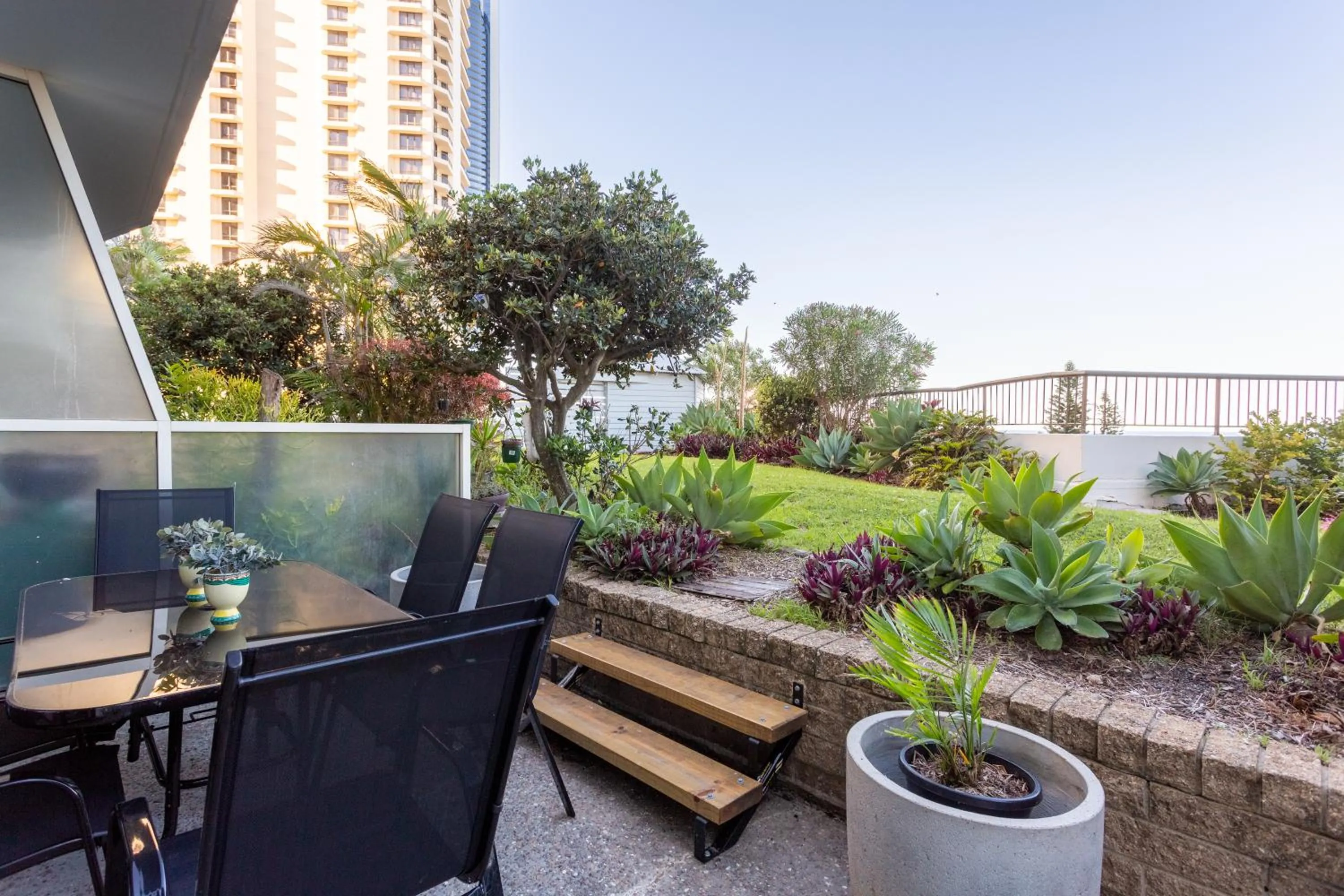 Patio in Oceanfront Family Apartment Pool & BBQ