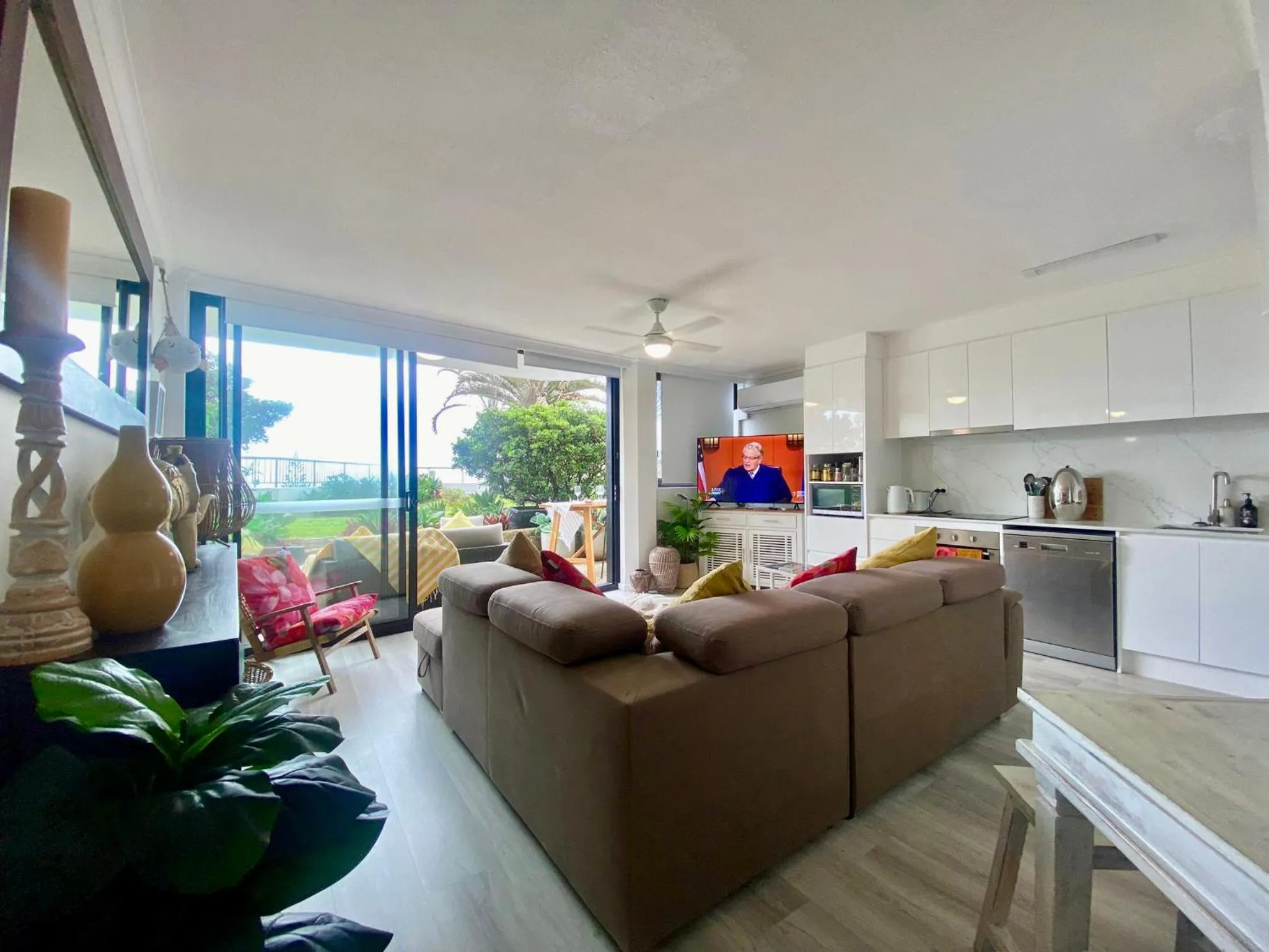 Living room in Oceanfront Family Apartment Pool & BBQ