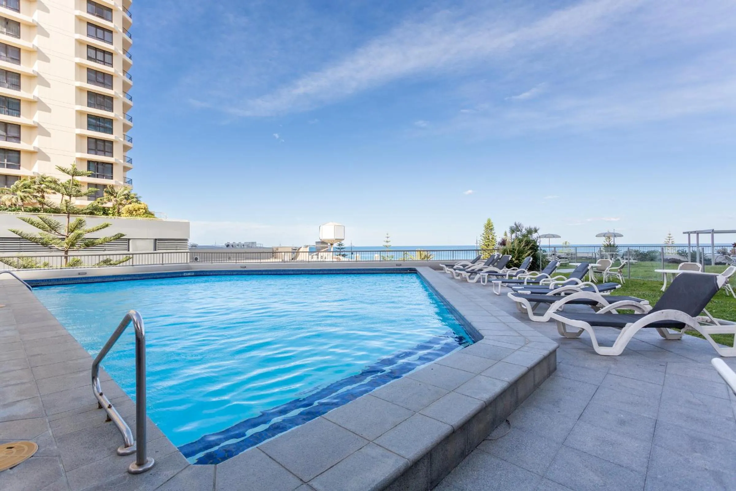 Swimming pool in Oceanfront Family Apartment Pool & BBQ