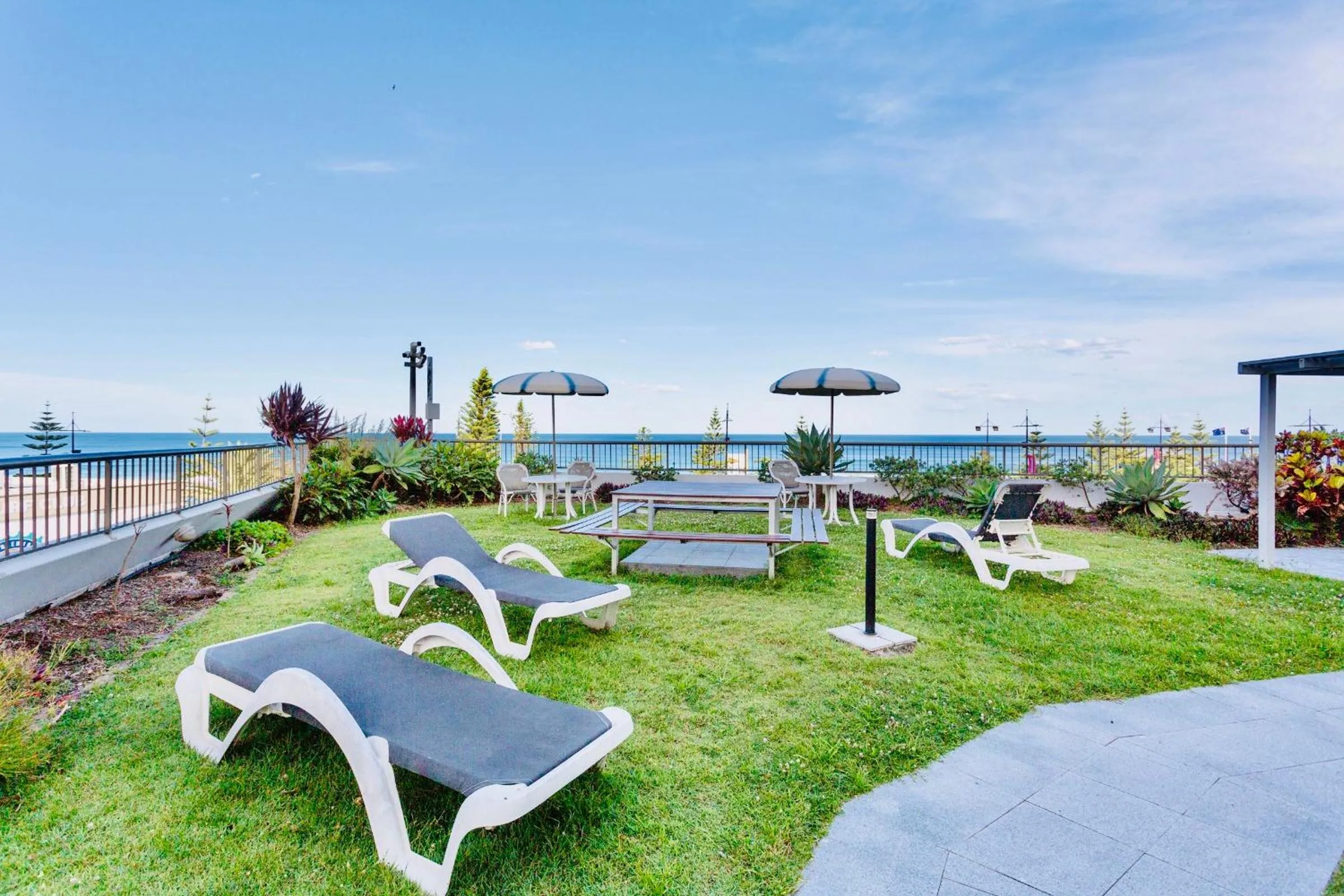 Garden in Oceanfront Family Apartment Pool & BBQ
