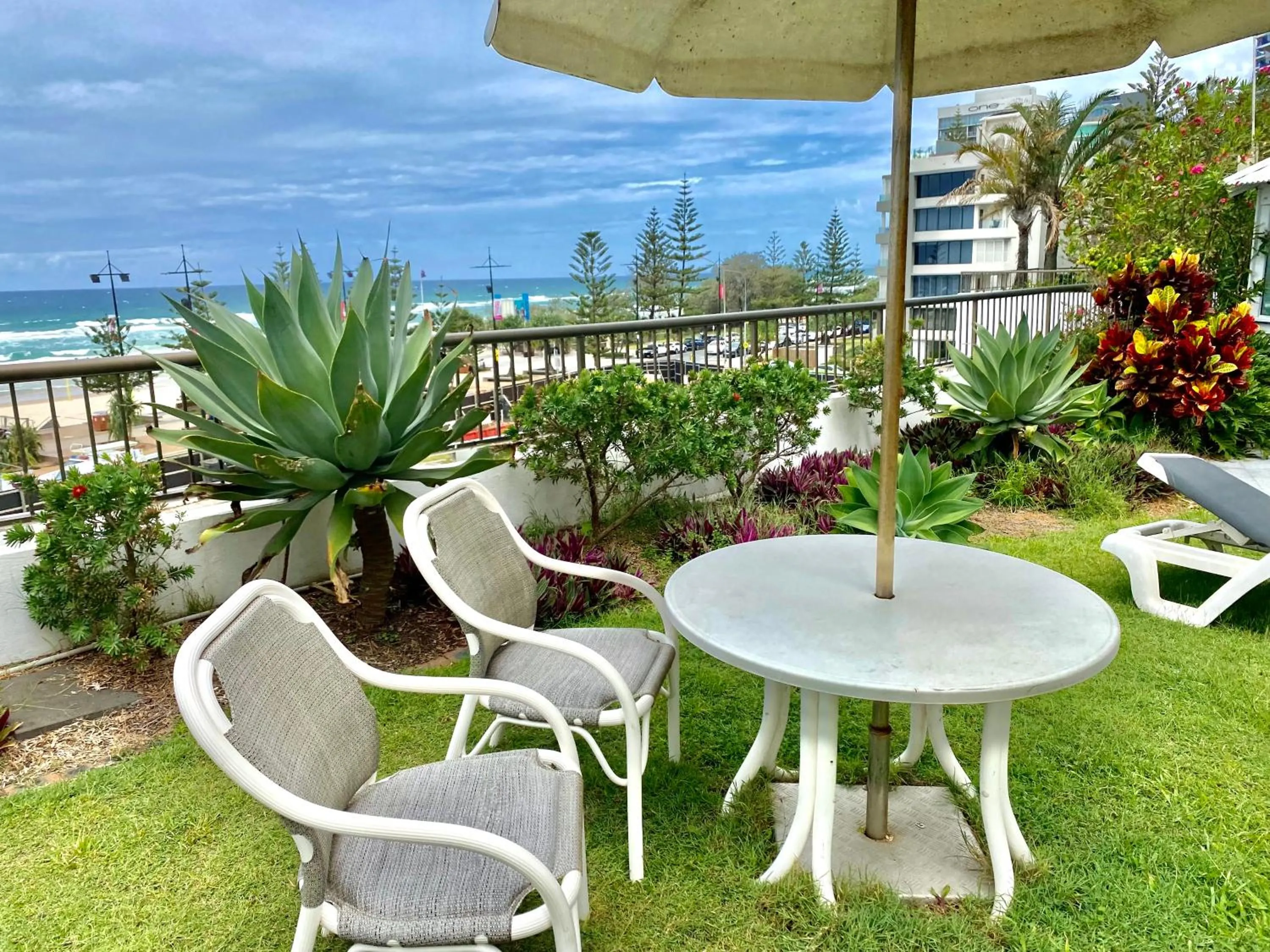 Patio in Oceanfront Family Apartment Pool & BBQ