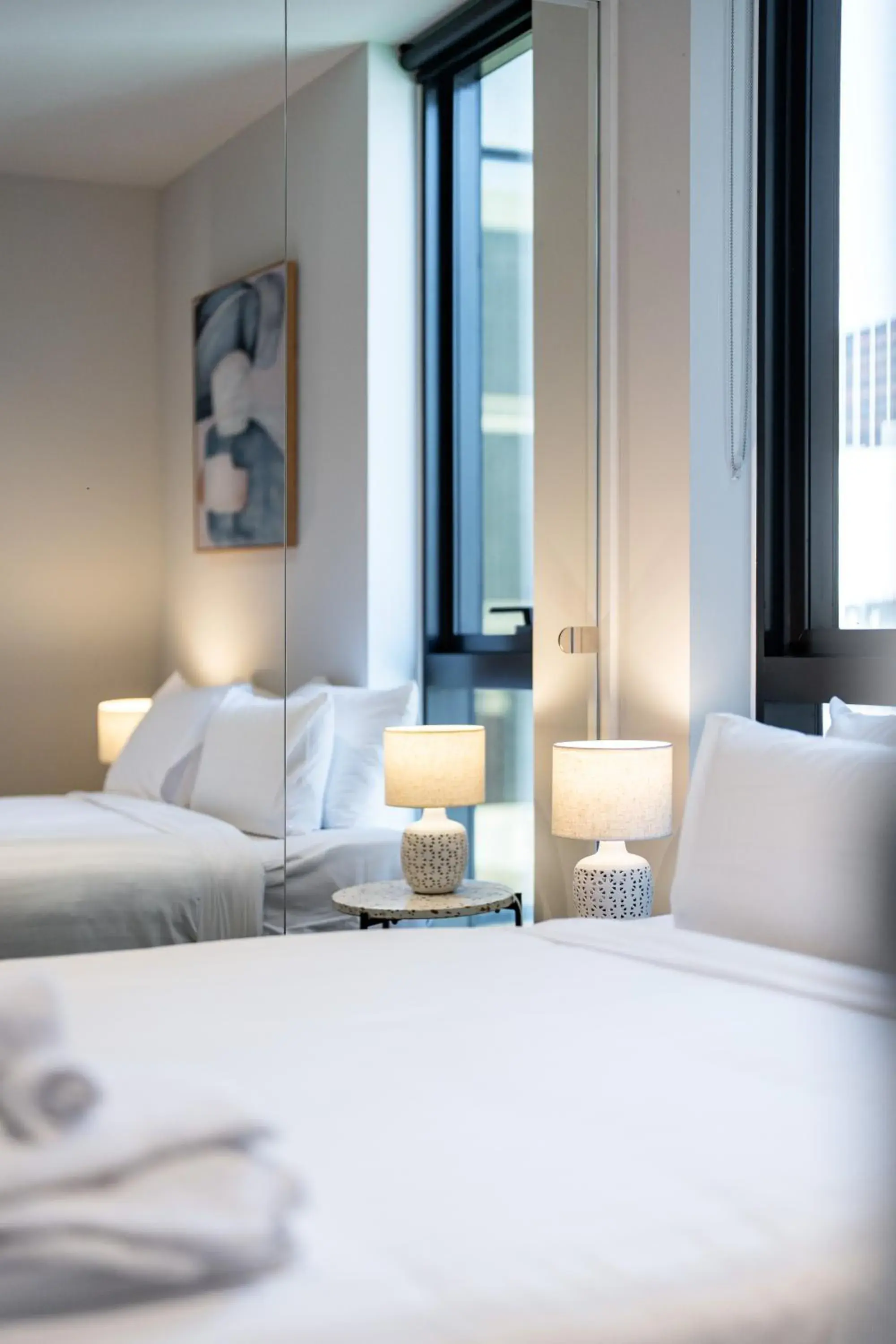 Bed in Paragon Apartments by CLLIX Bed in Paragon Apartments by CLLIX