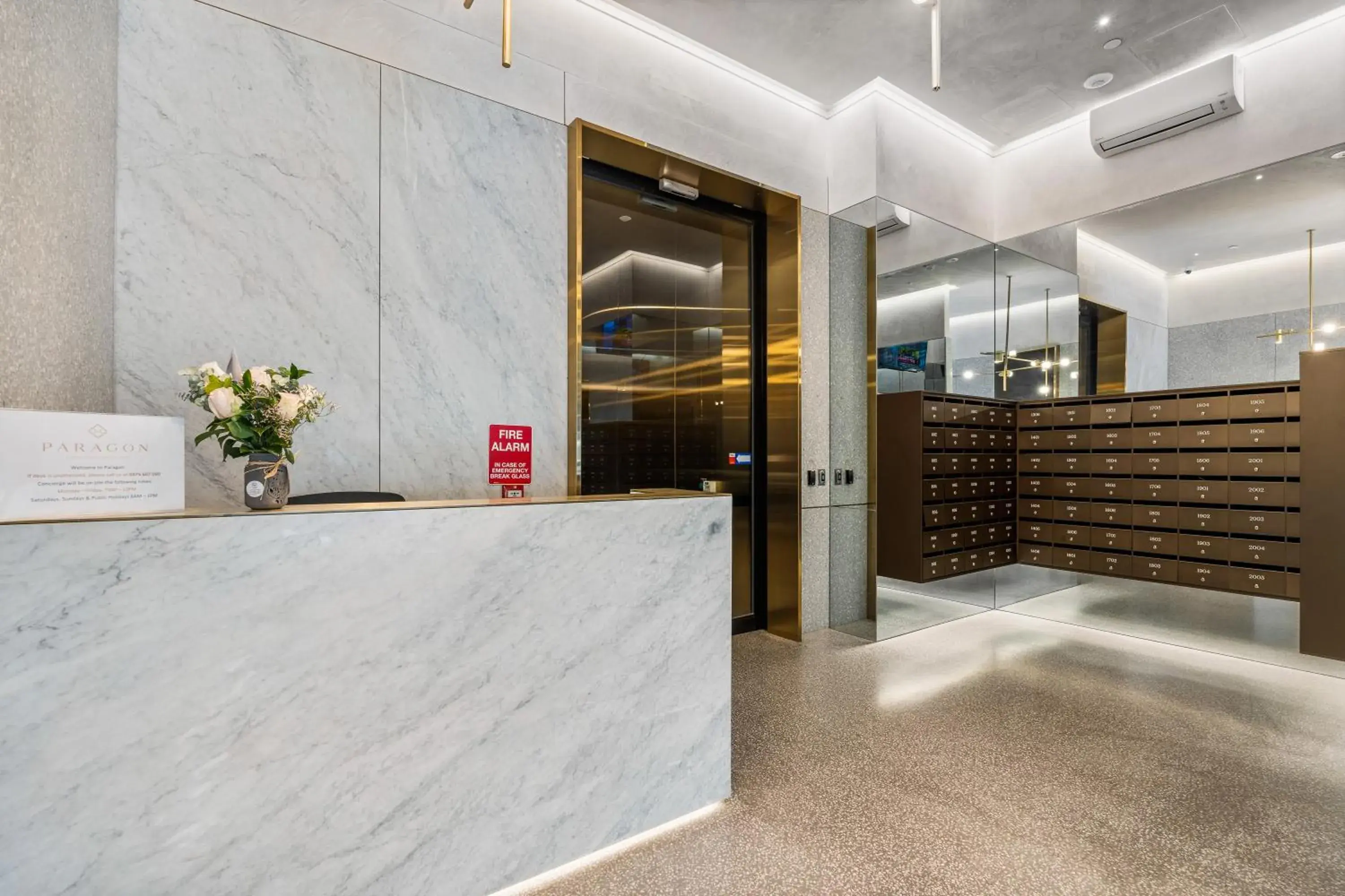 Lobby or reception in Paragon Apartments by CLLIX Lobby or reception in Paragon Apartments by CLLIX