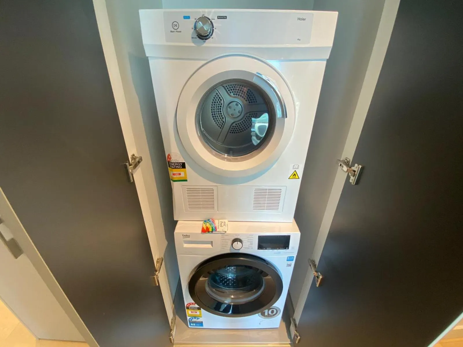 laundry in Paragon Apartments by CLLIX