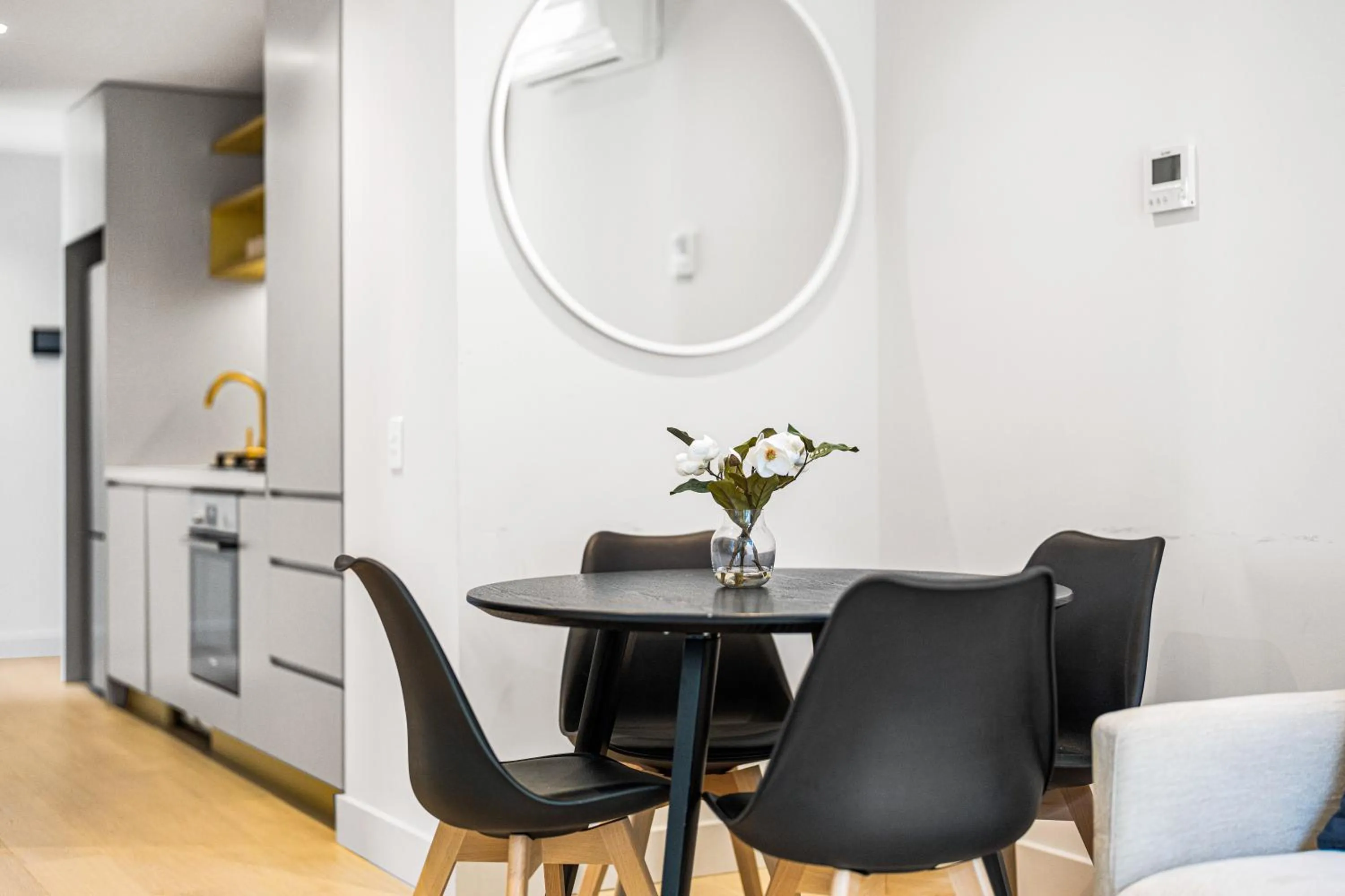 Dining area in Paragon Apartments by CLLIX