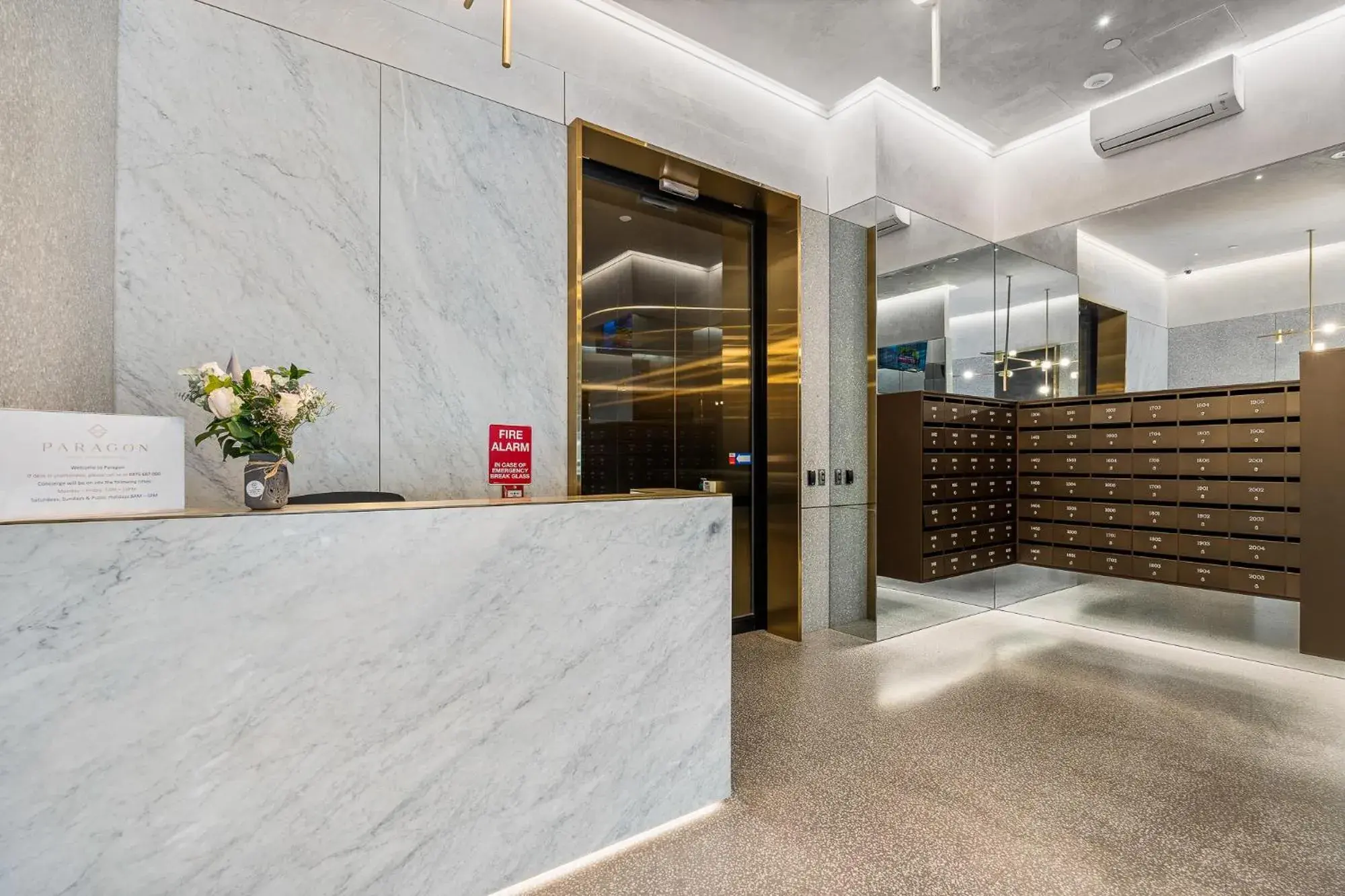 Lobby or reception in Paragon Apartments by CLLIX Lobby or reception in Paragon Apartments by CLLIX