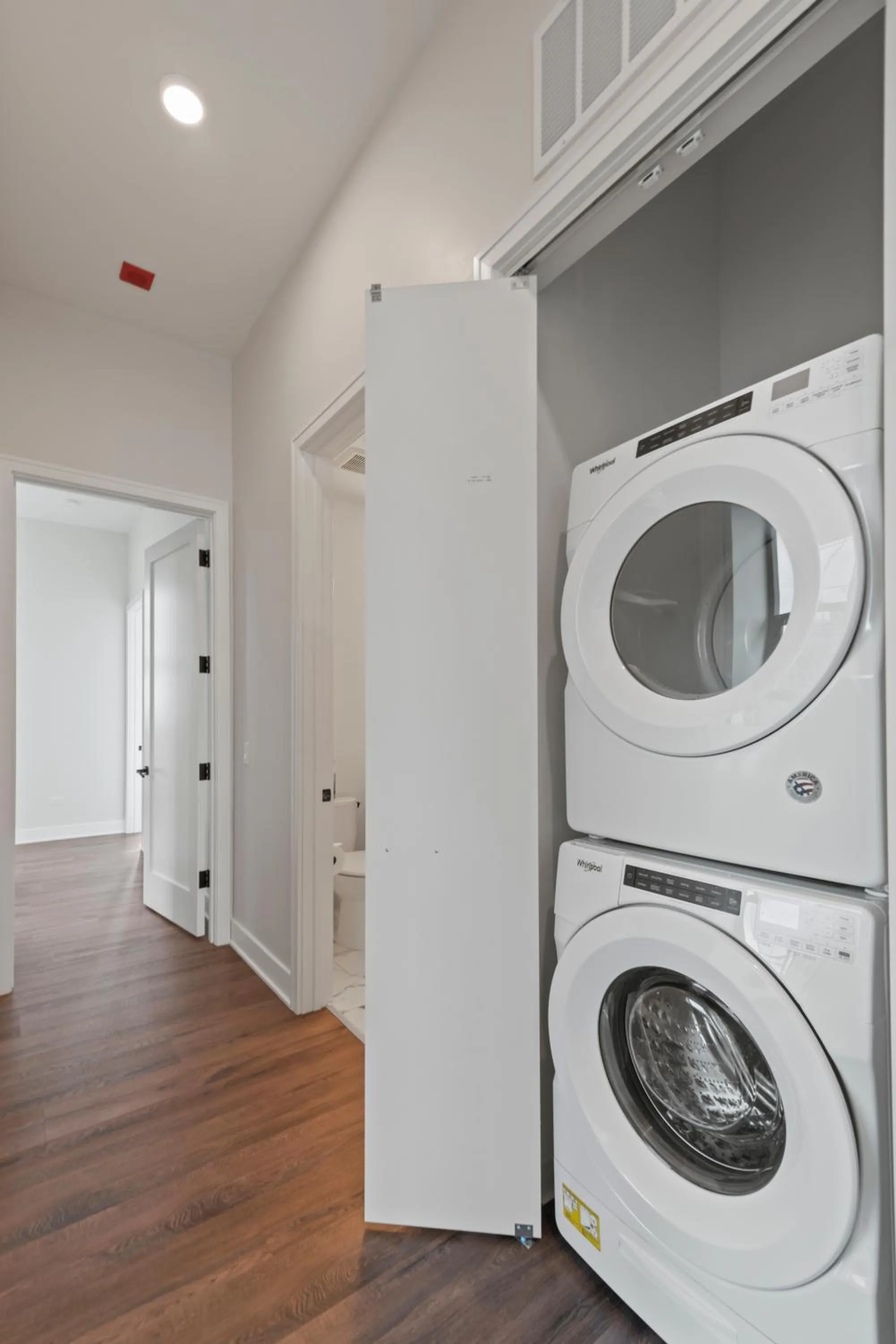 washing machine in Avra Stylish Apartments Prime West Loop Location Near Union Park