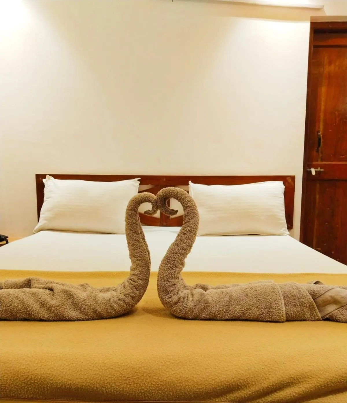 Bed in Blue Sea Beach Resort