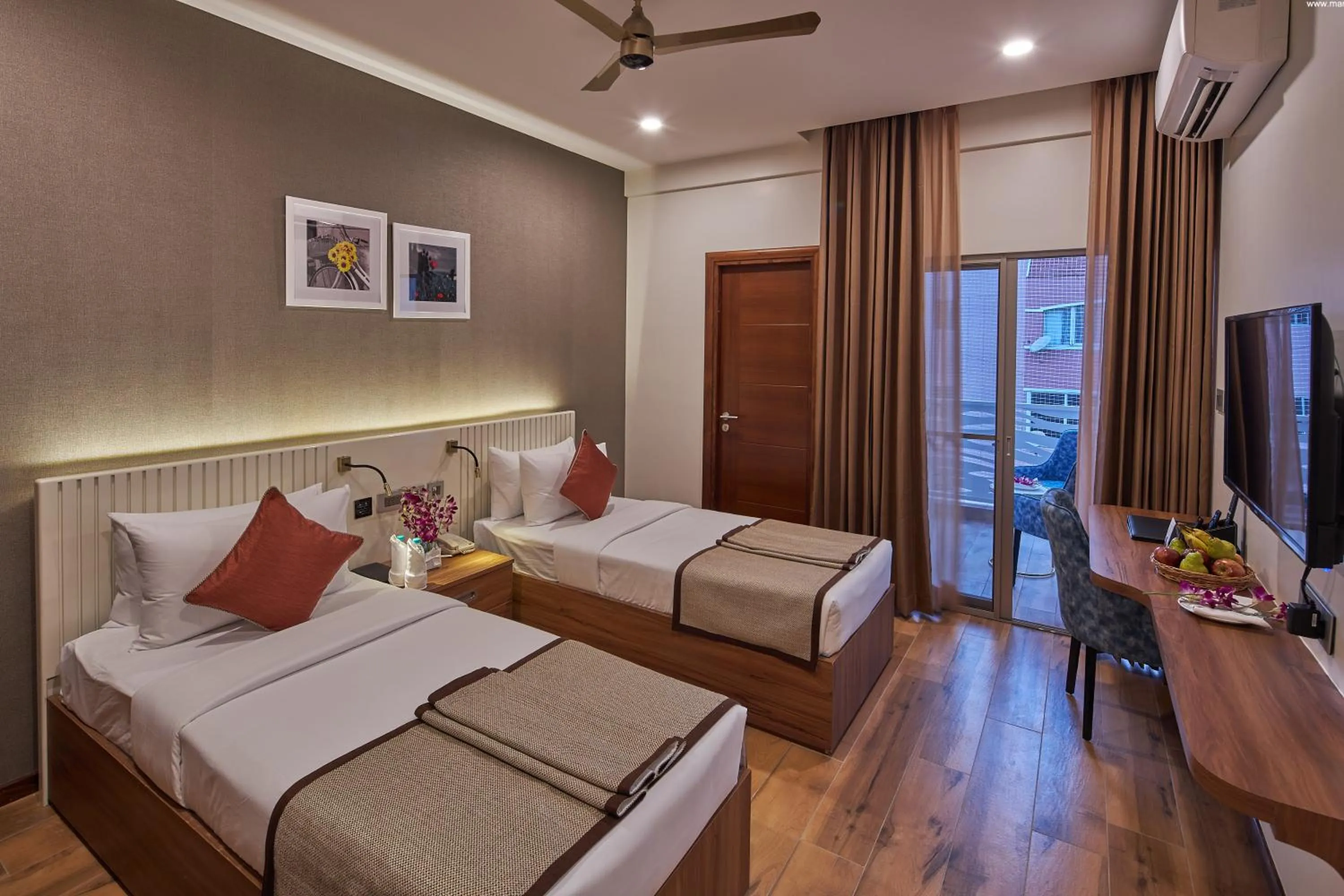 Bedroom, Bed in Regenta Inn Grand-ORR, Mahadevapura
