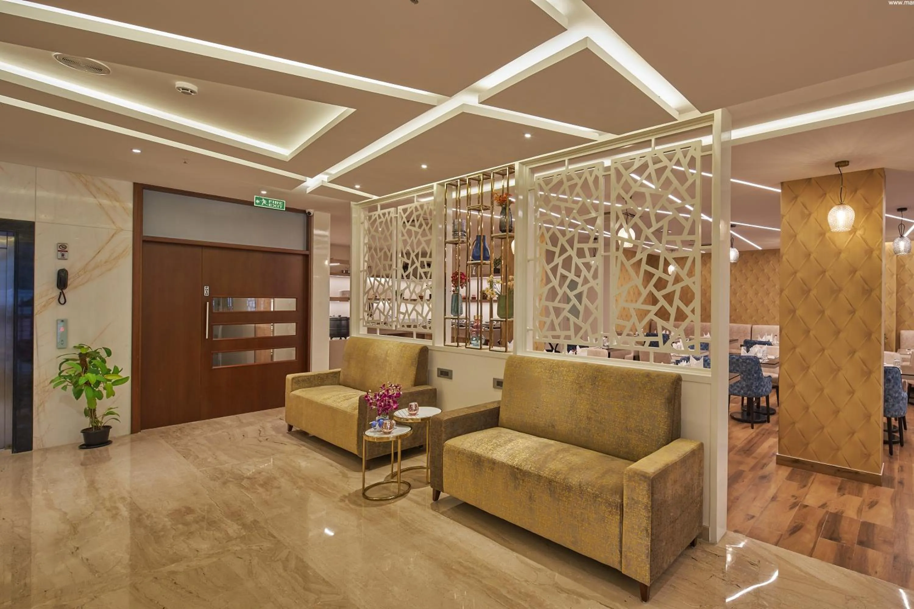 Seating area in Regenta Inn Grand-ORR, Mahadevapura