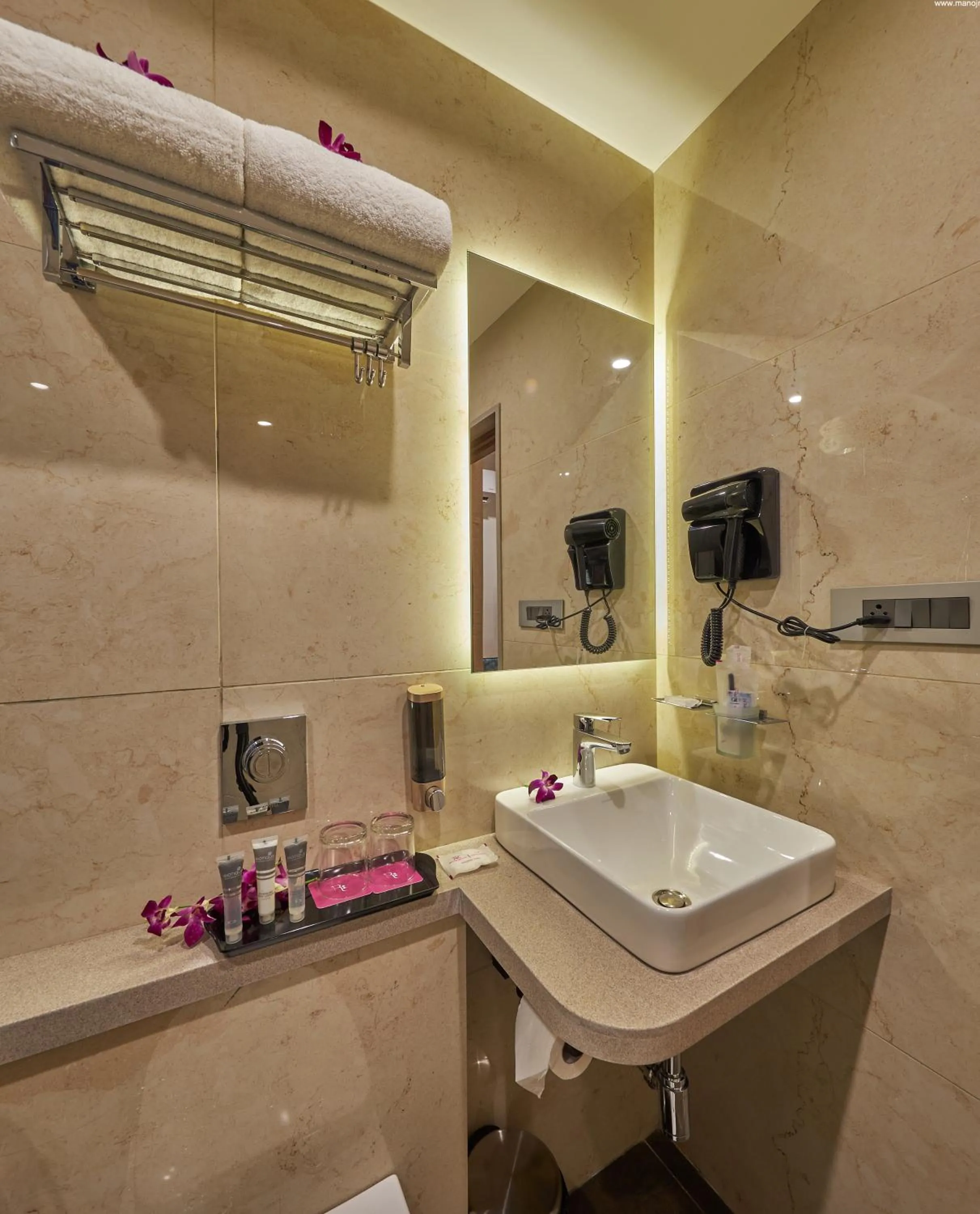 Bathroom in Regenta Inn Grand-ORR, Mahadevapura