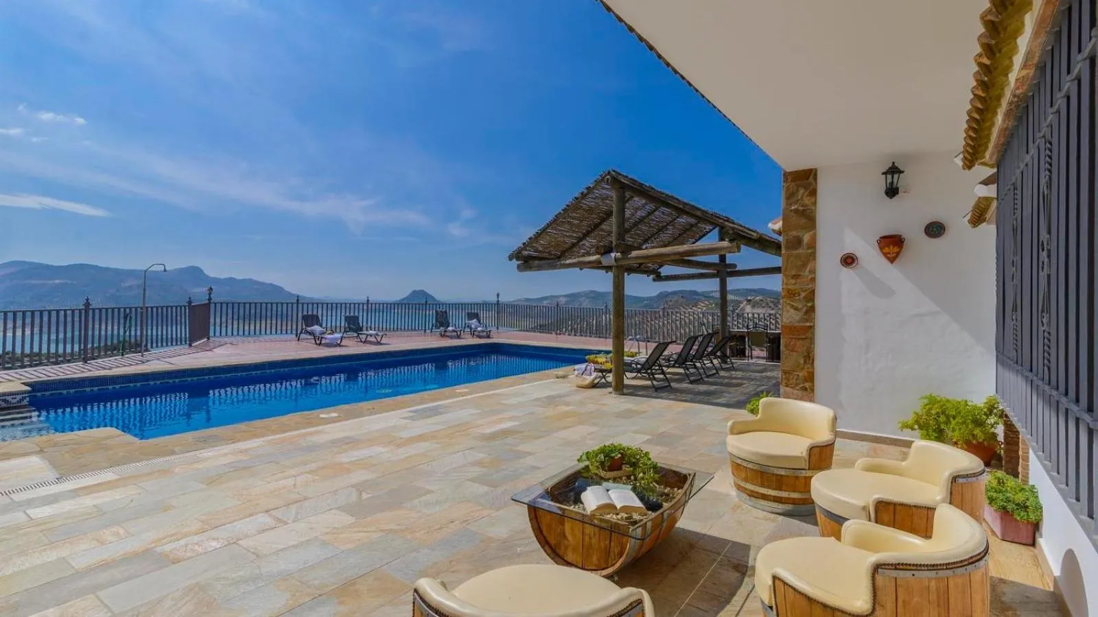 Swimming pool in La Villa del Lago Iznájar by Ruralidays