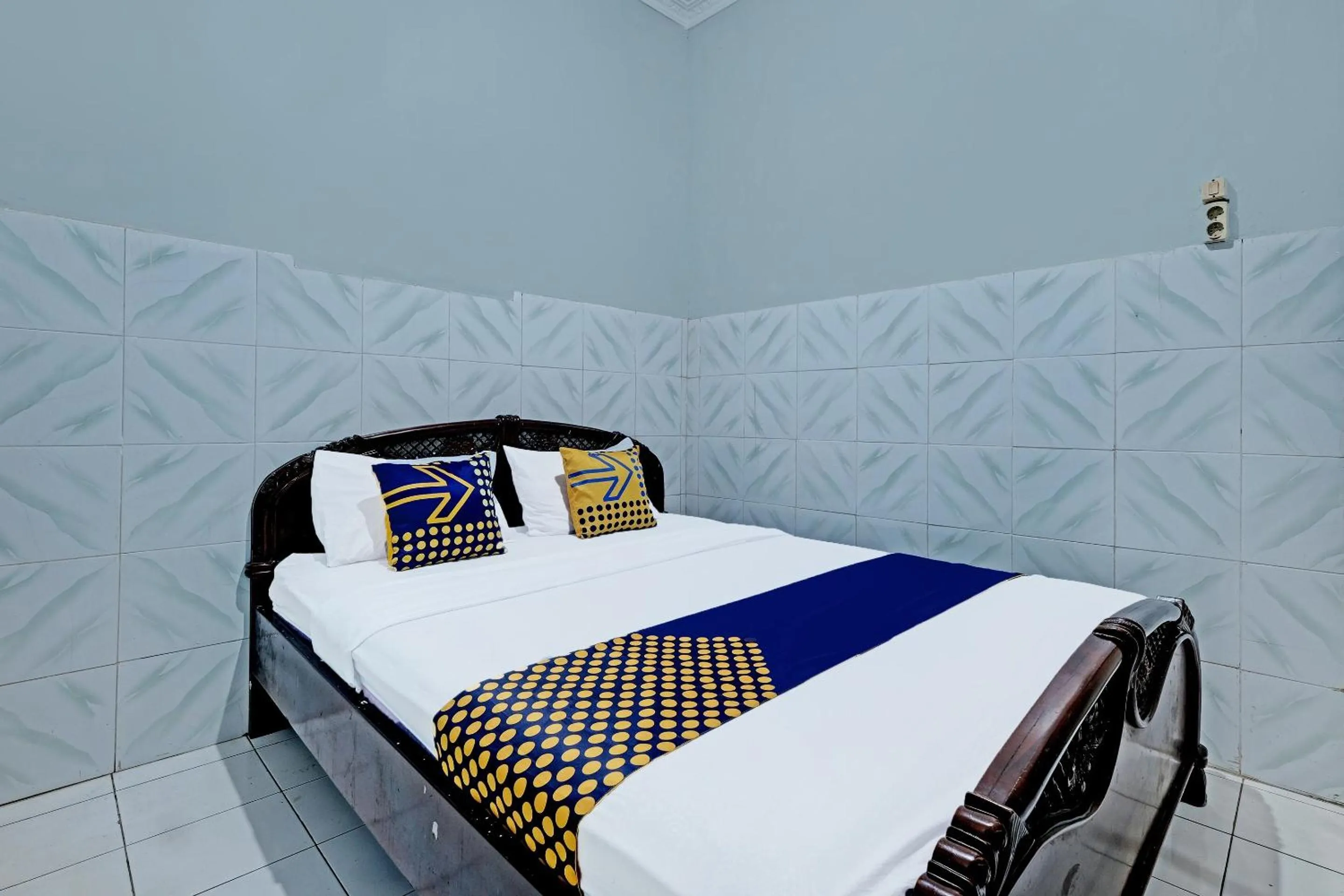 Bedroom in SPOT ON 91915 Homestay Superman