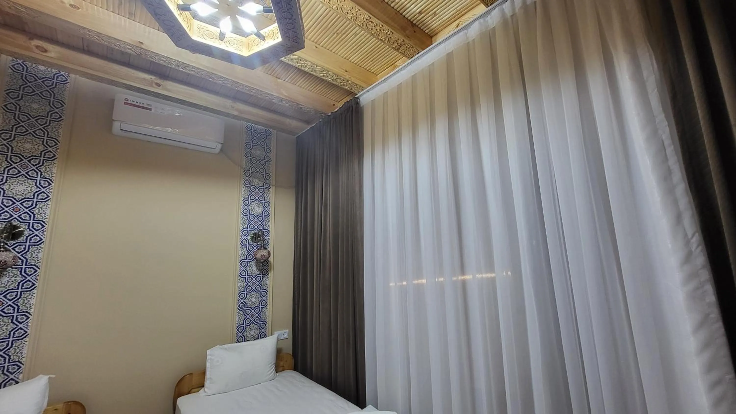 Bed in Ulli Oy Boutique Hotel & Terrace