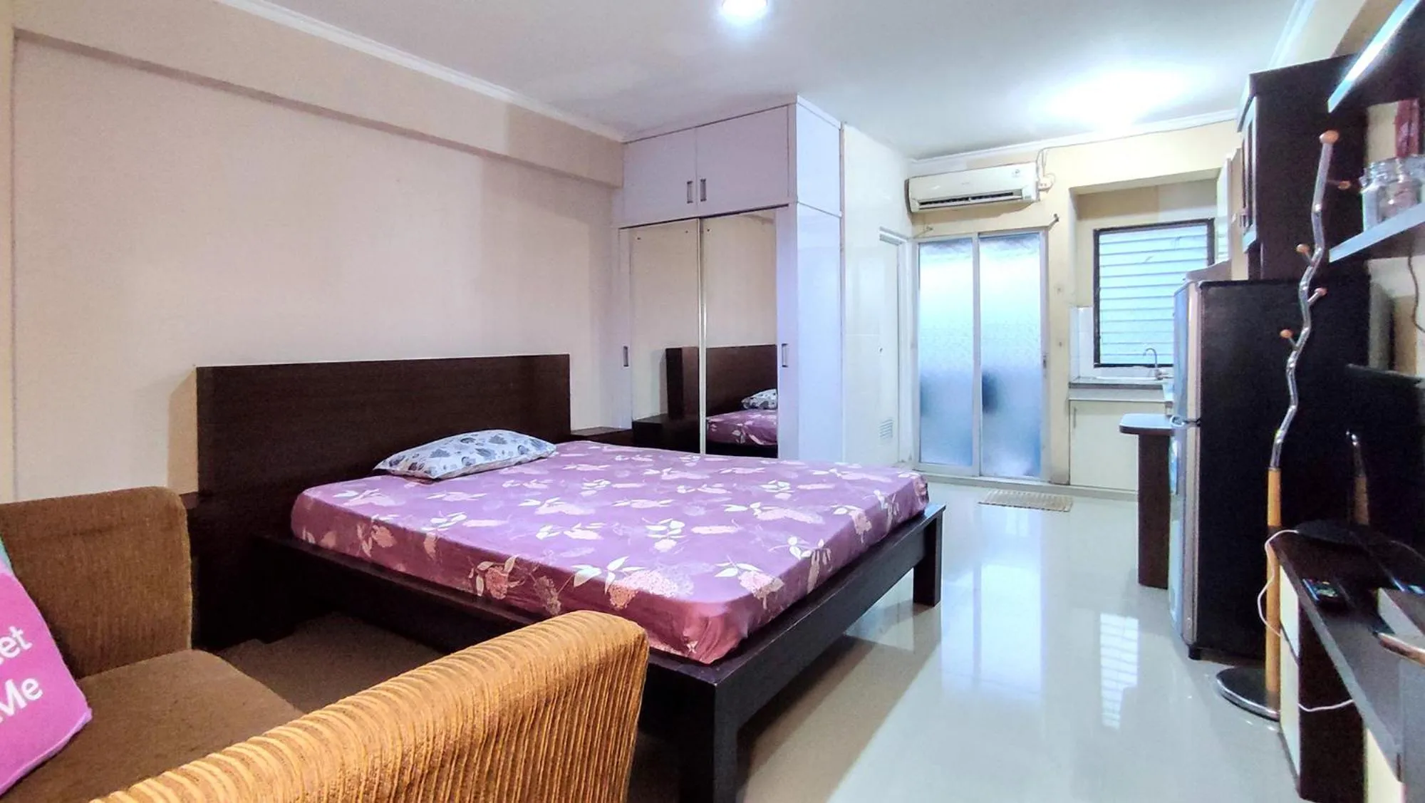 Bed in Lily Room at Apartment Cibubur Village