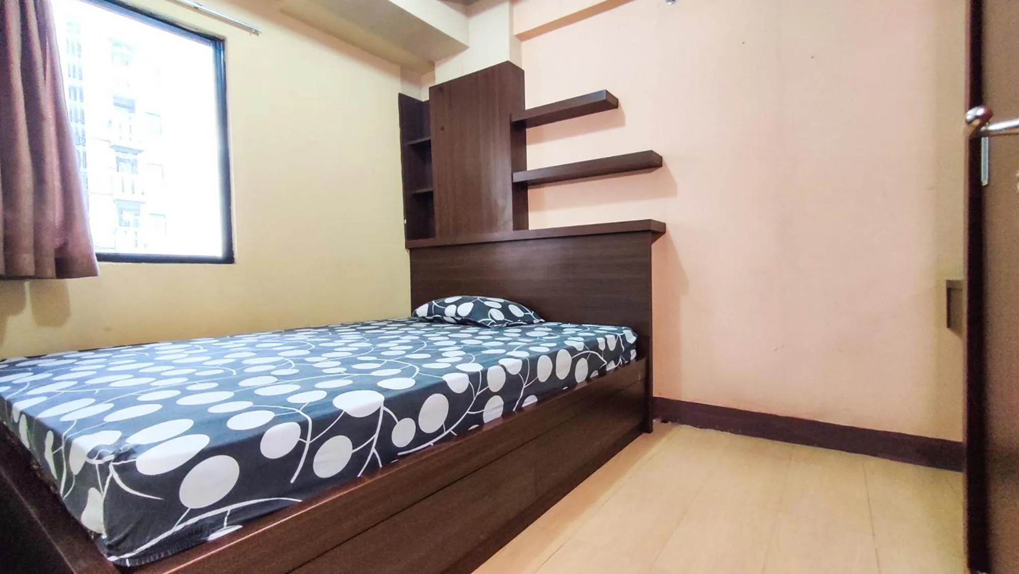 Bed in Lily Room at Apartment Cibubur Village