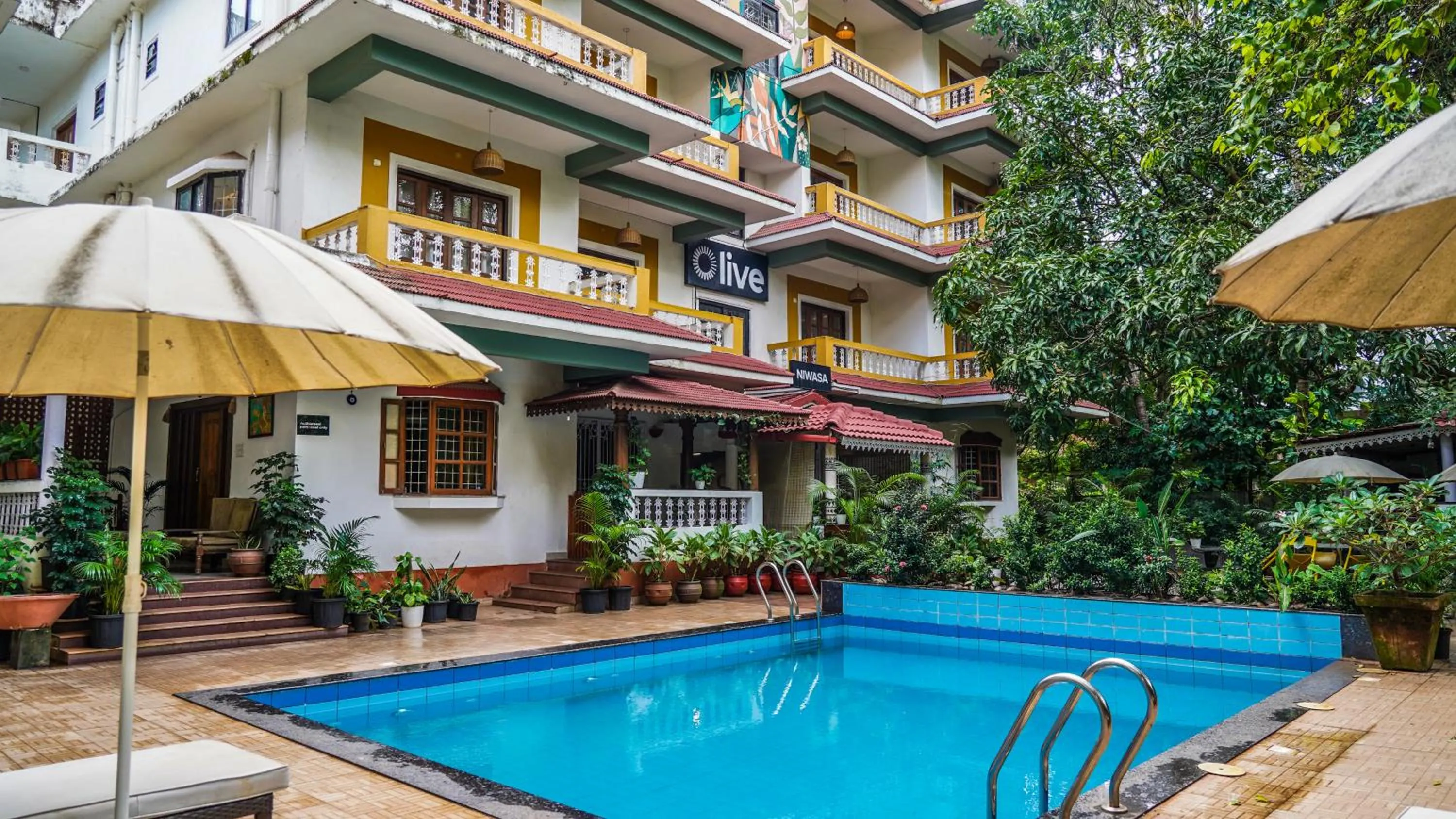 Swimming pool in Olive Hotel Calangute Niwasa by Embassy Group