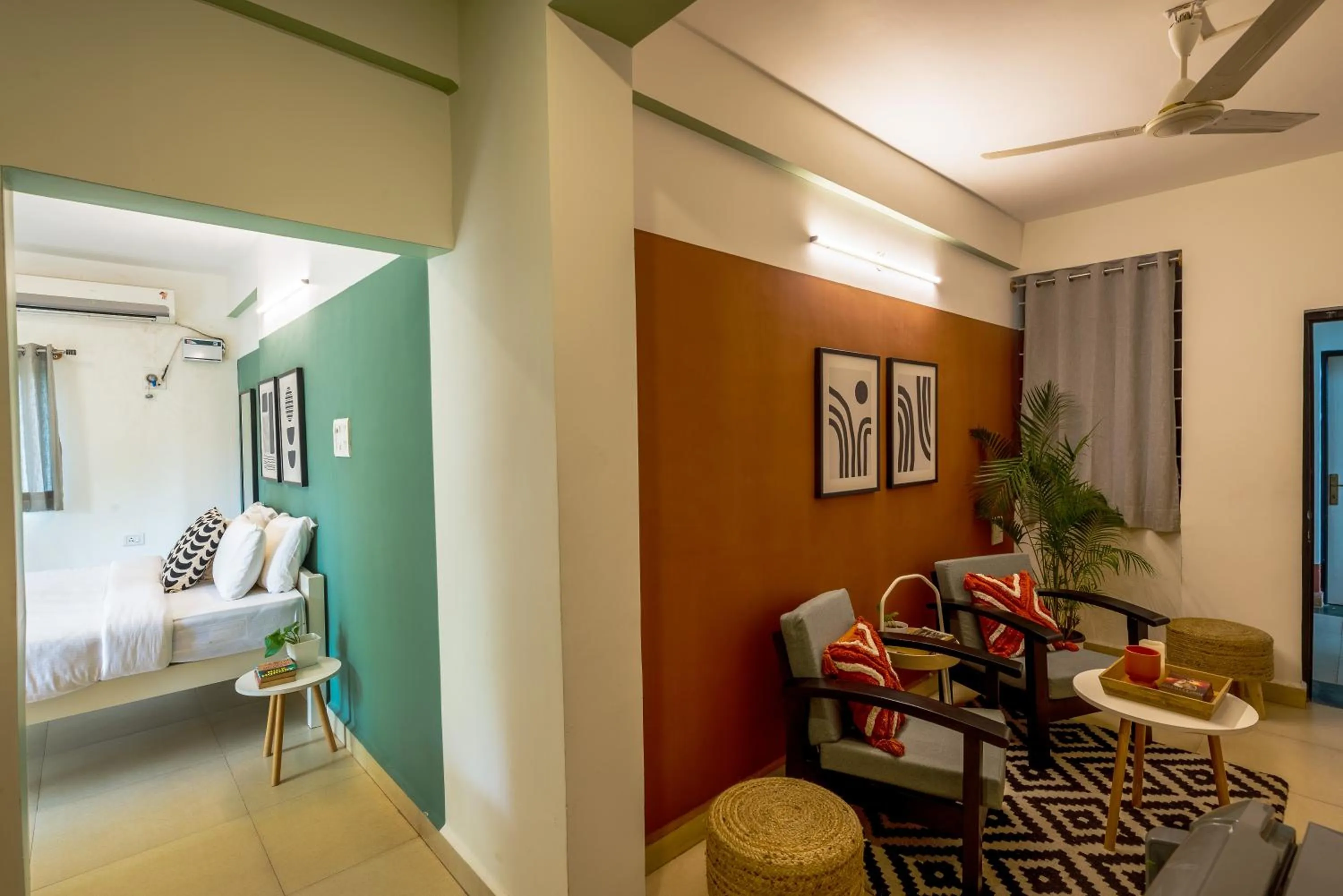 Living room, Bed in Olive Hotel Calangute Niwasa by Embassy Group