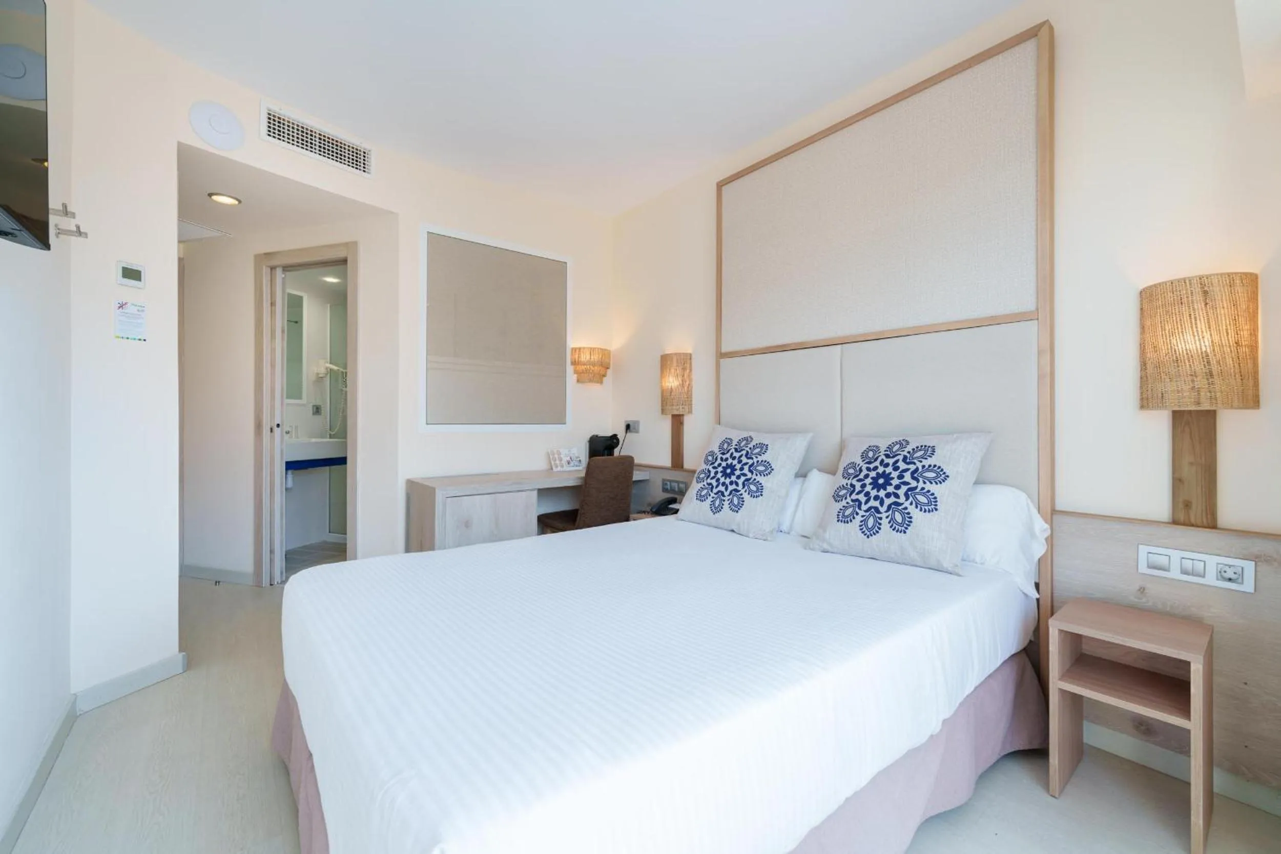 Bed in Caprice Janeiro Hotel & Spa