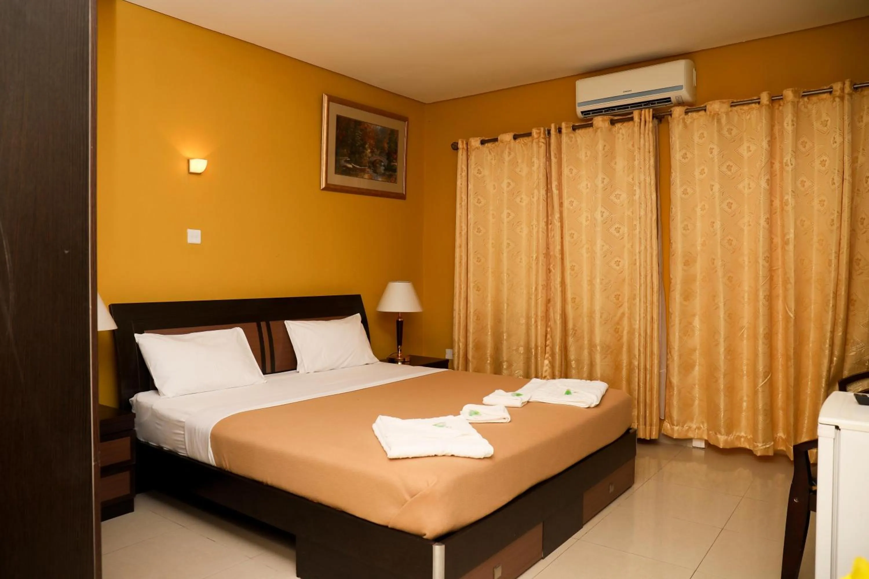 Bed in Mansea Beach Hotel