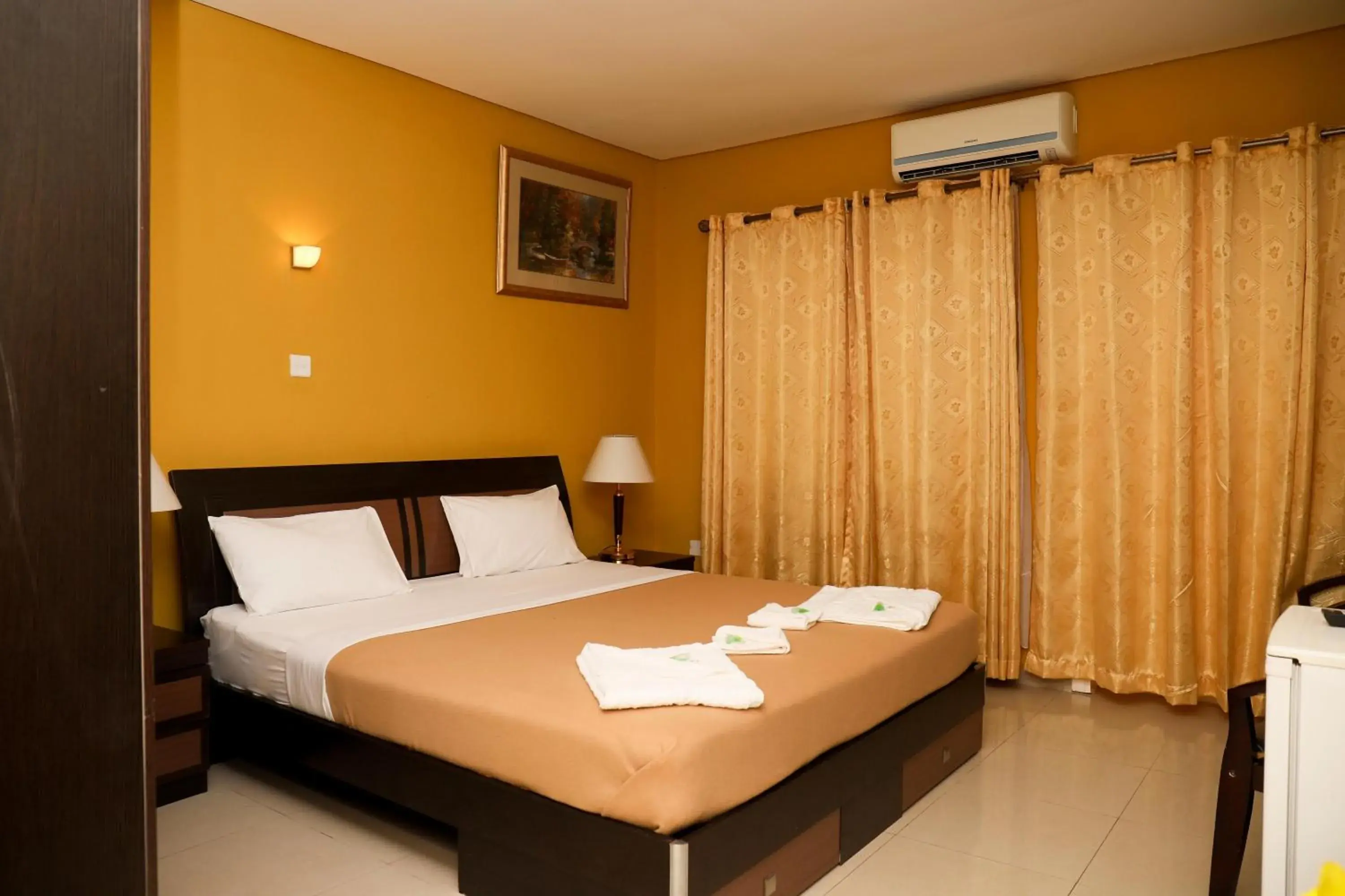 Bed in Mansea Beach Hotel Bed in Mansea Beach Hotel