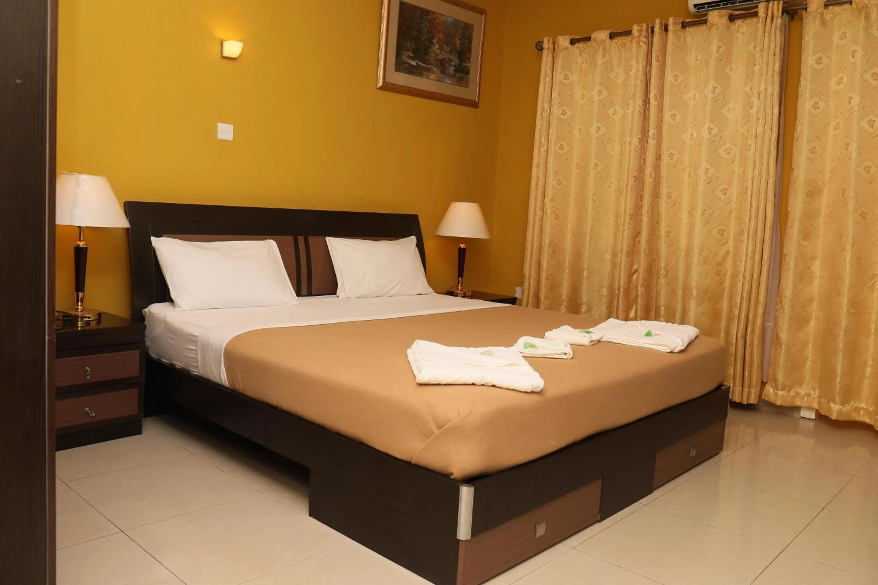 Bed in Mansea Beach Hotel