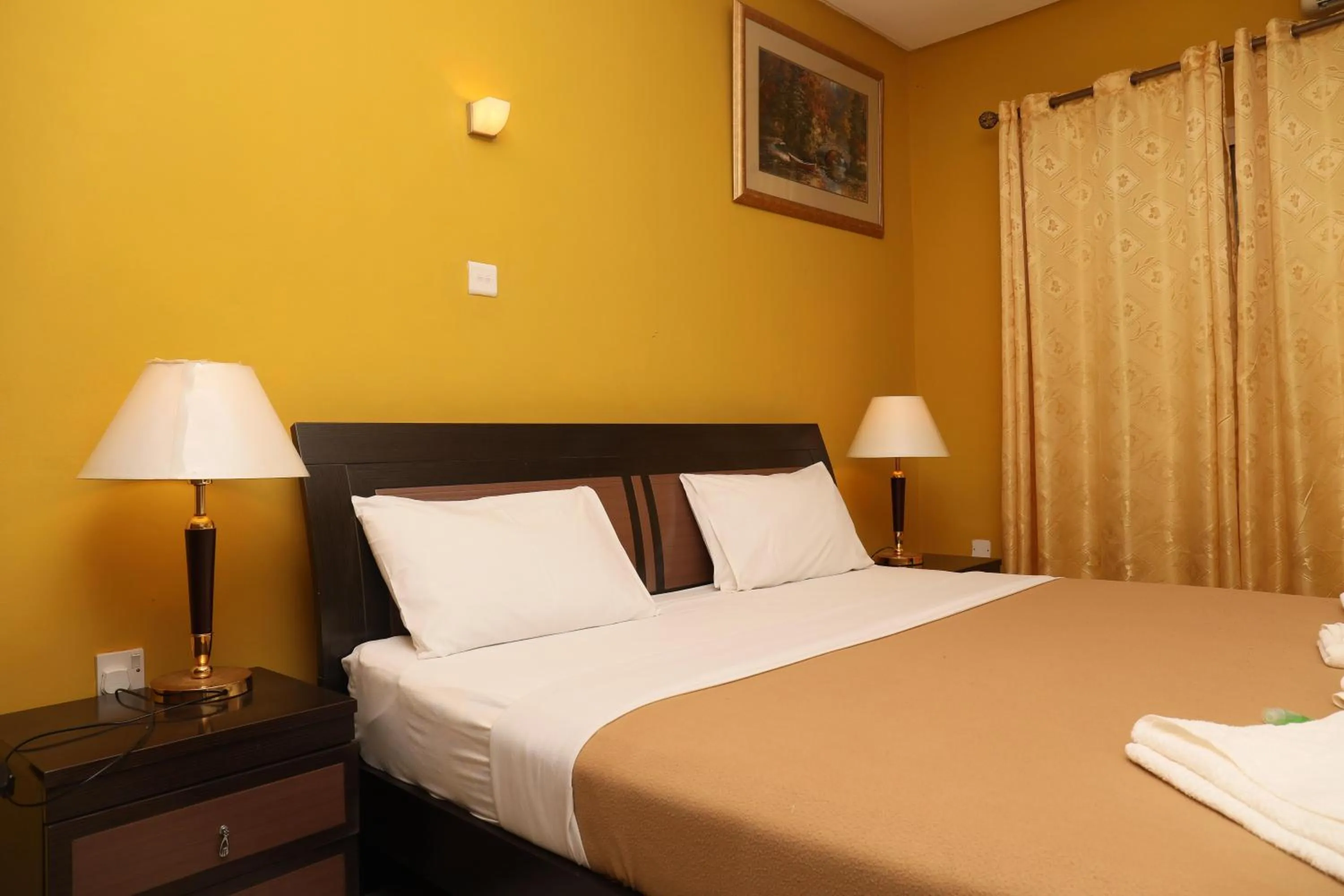 Bed in Mansea Beach Hotel