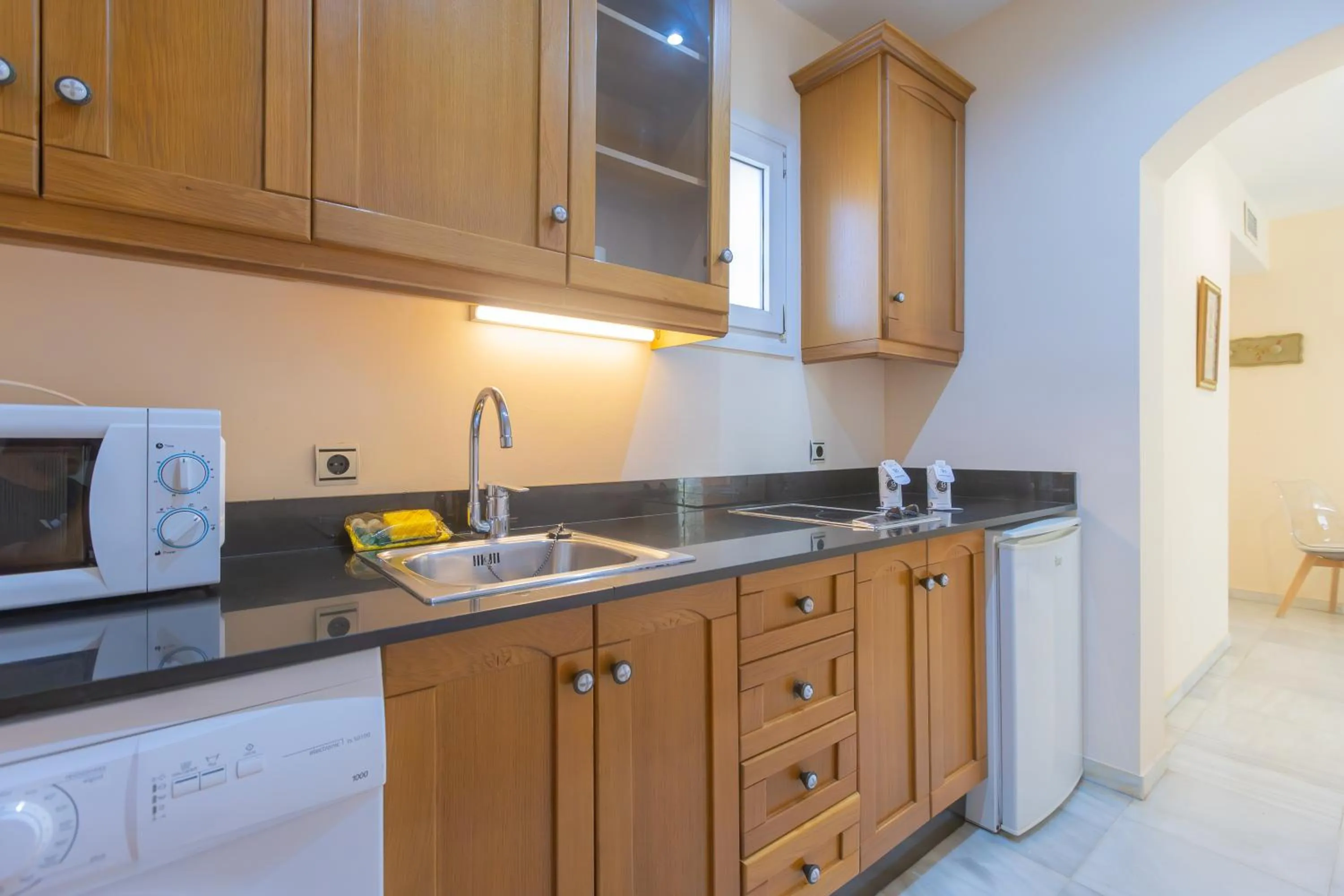 Kitchen or kitchenette in Apartamentos Soho Boutique Vistahermosa